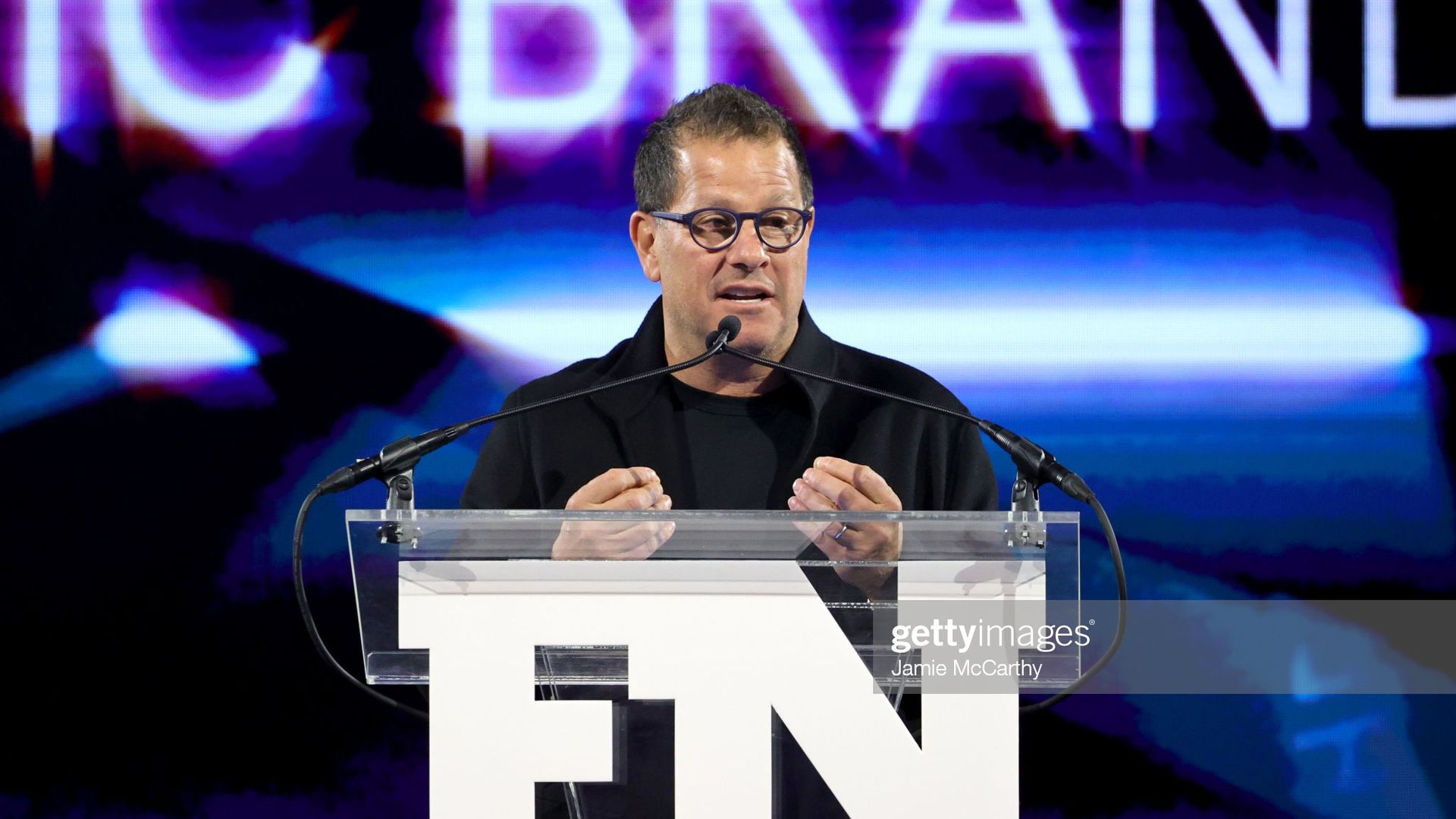 Jamie Salter speaking at an event