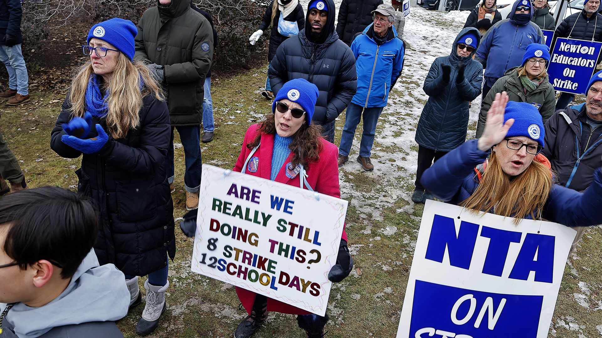 Striking teachers outside Newton City Hall