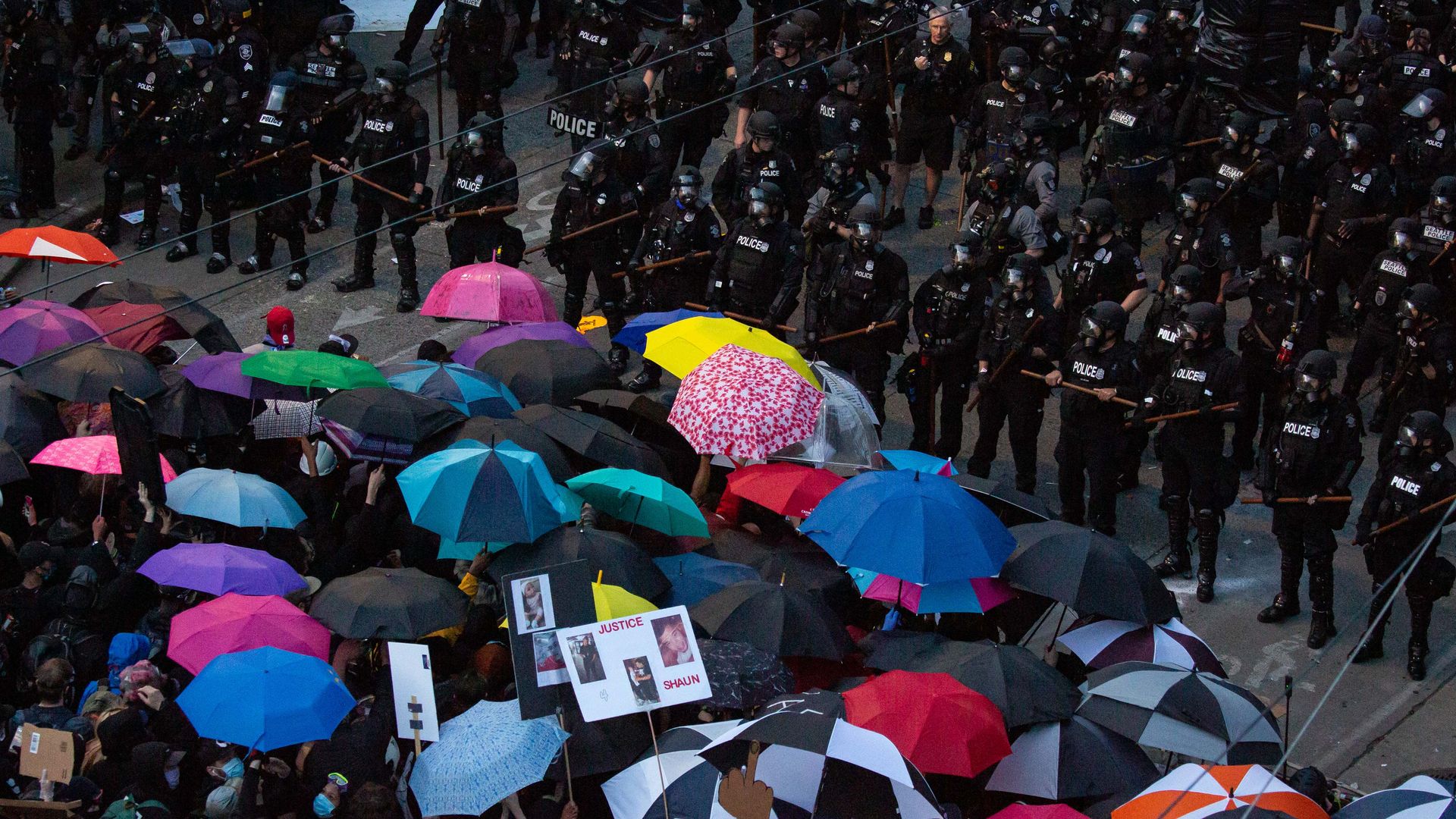 Protesters in Seattle facing law enforcement personnel on June 6.