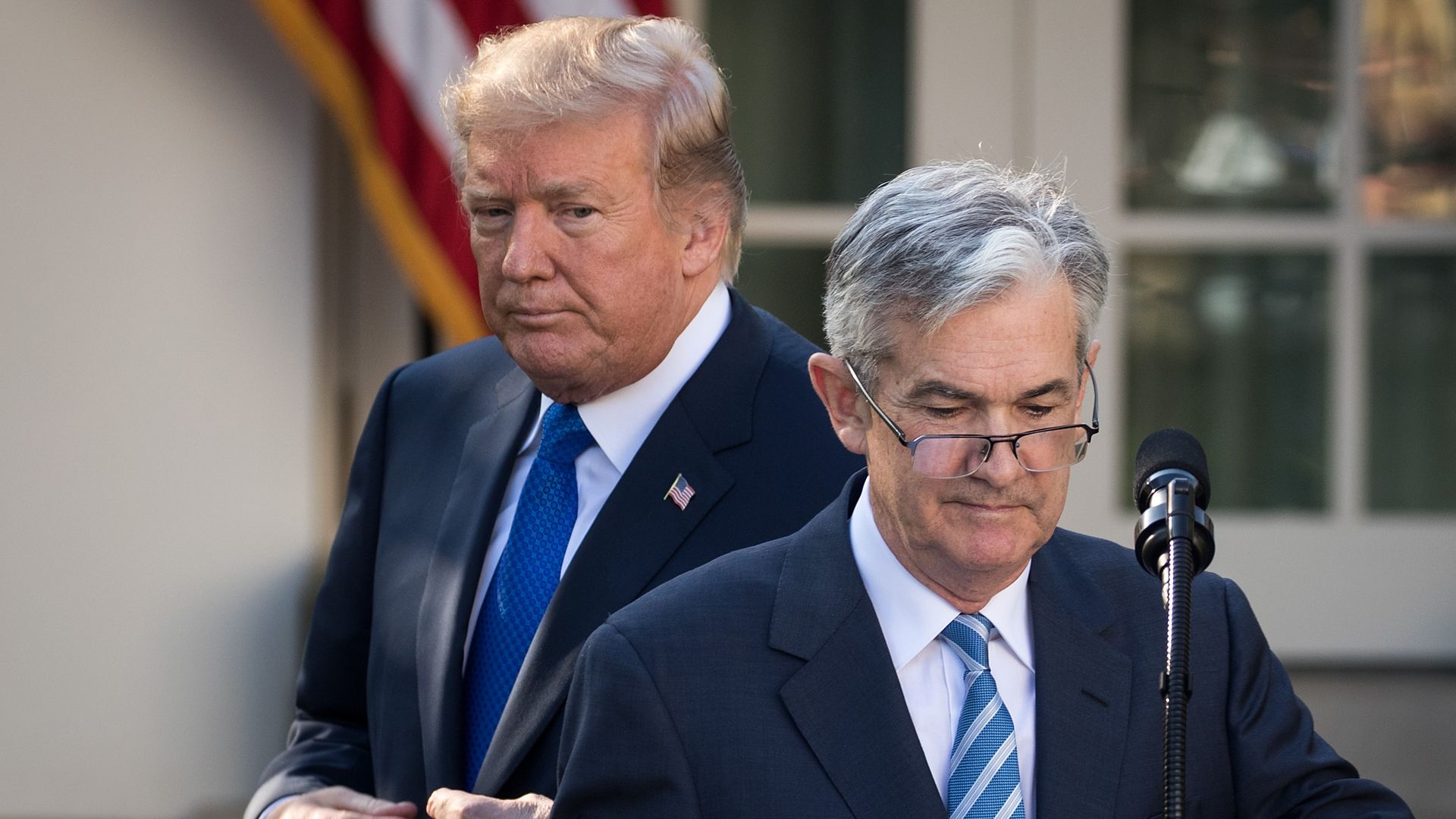 Former president Donald Trump and Fed chair Jerome Powell