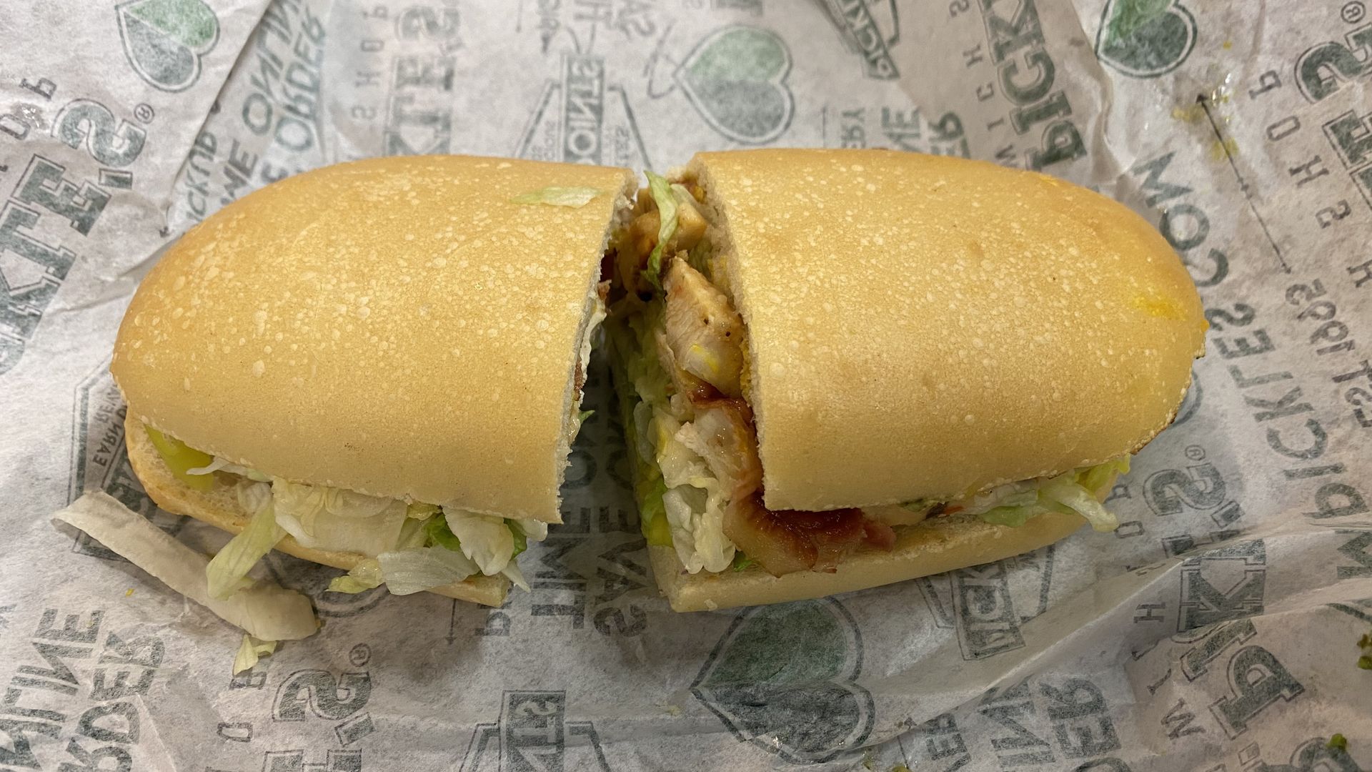 A sub sandwich cut in half.