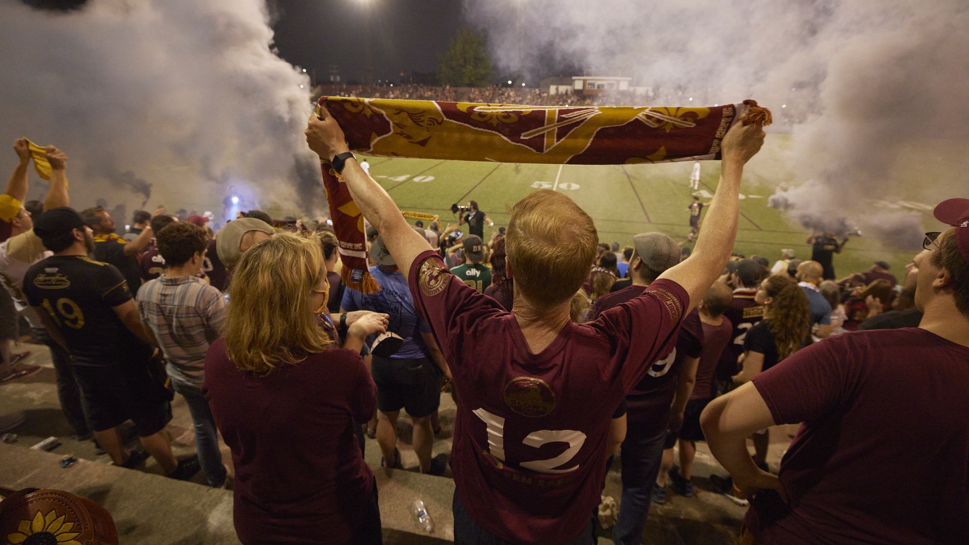 Detroit City FC fans celebrate.