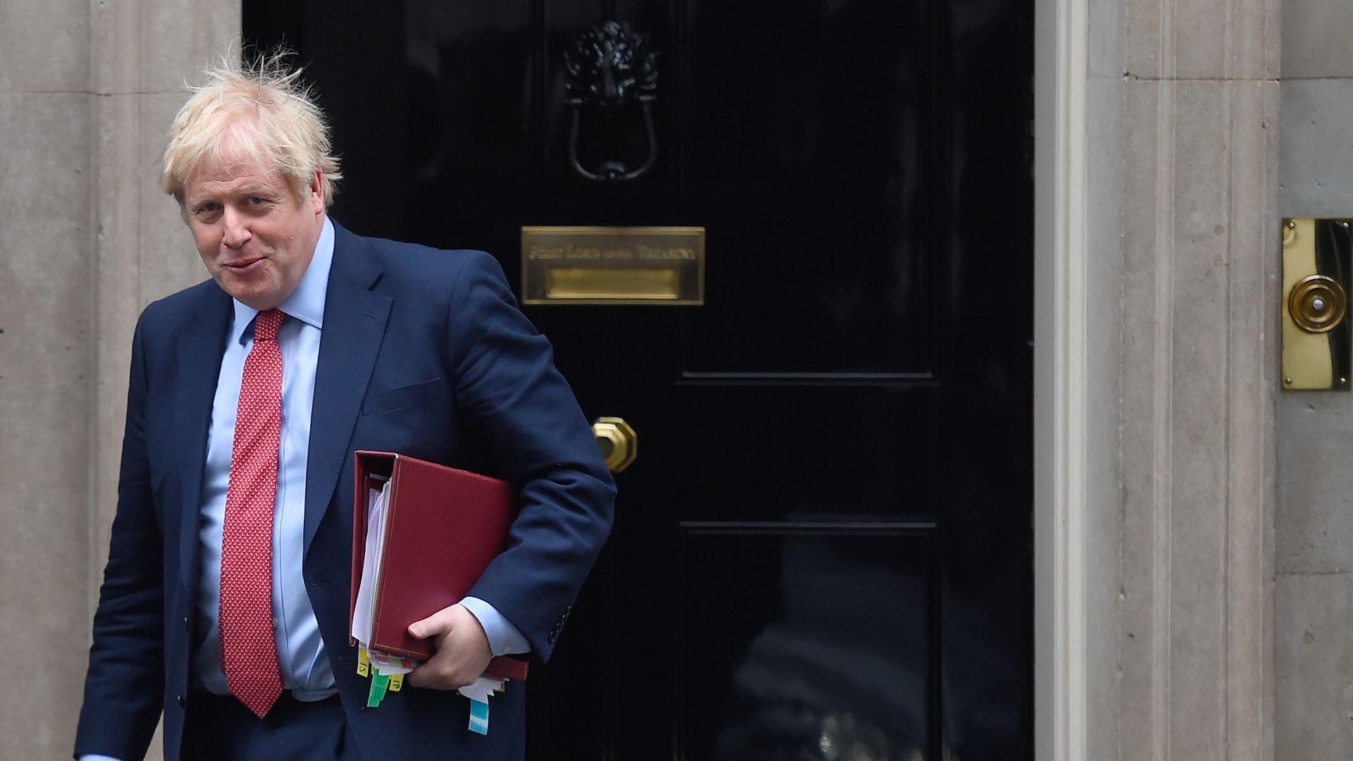 : British Prime Minister Boris Johnson leaves 10 Downing Street ahead of the weekly PMQs session on January 22, 2020 in London, England.
