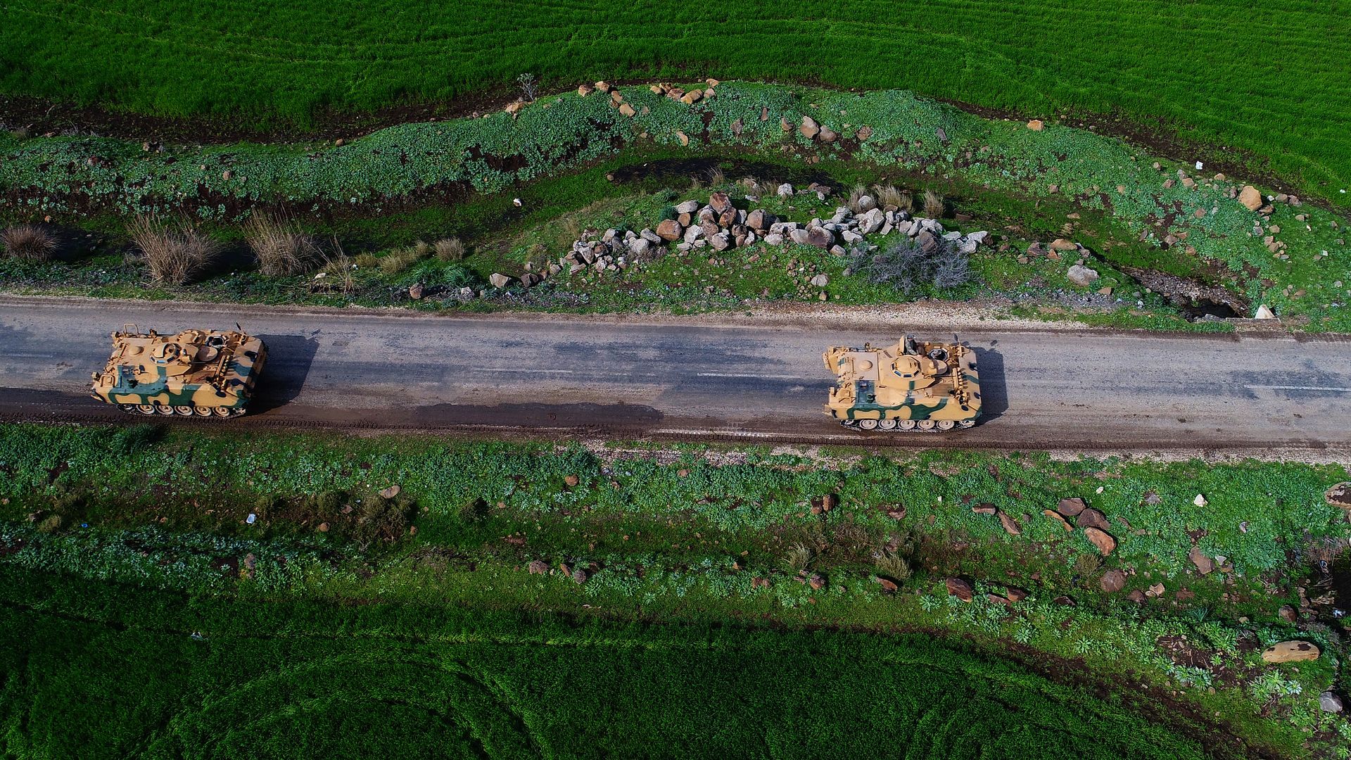 Aerial photo of two tanks on a road