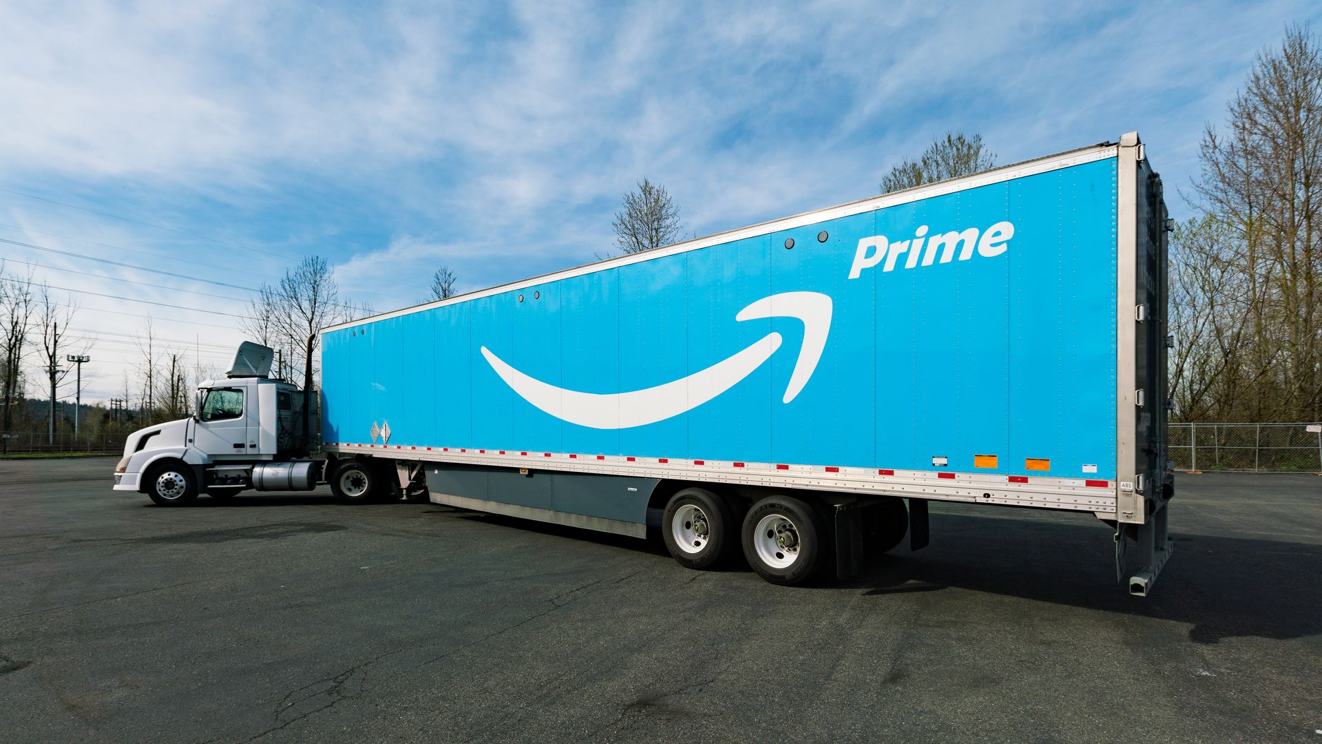 A semi truck with the Amazon Prime logo