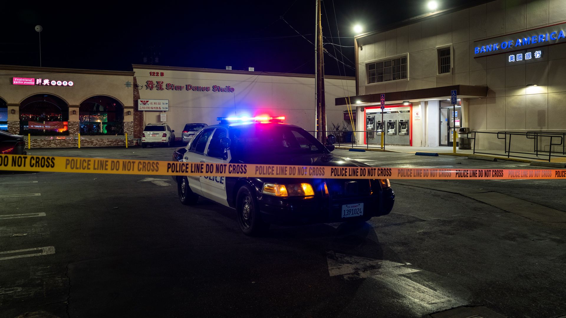 Police tape is seen near the scene of a deadly shooting
