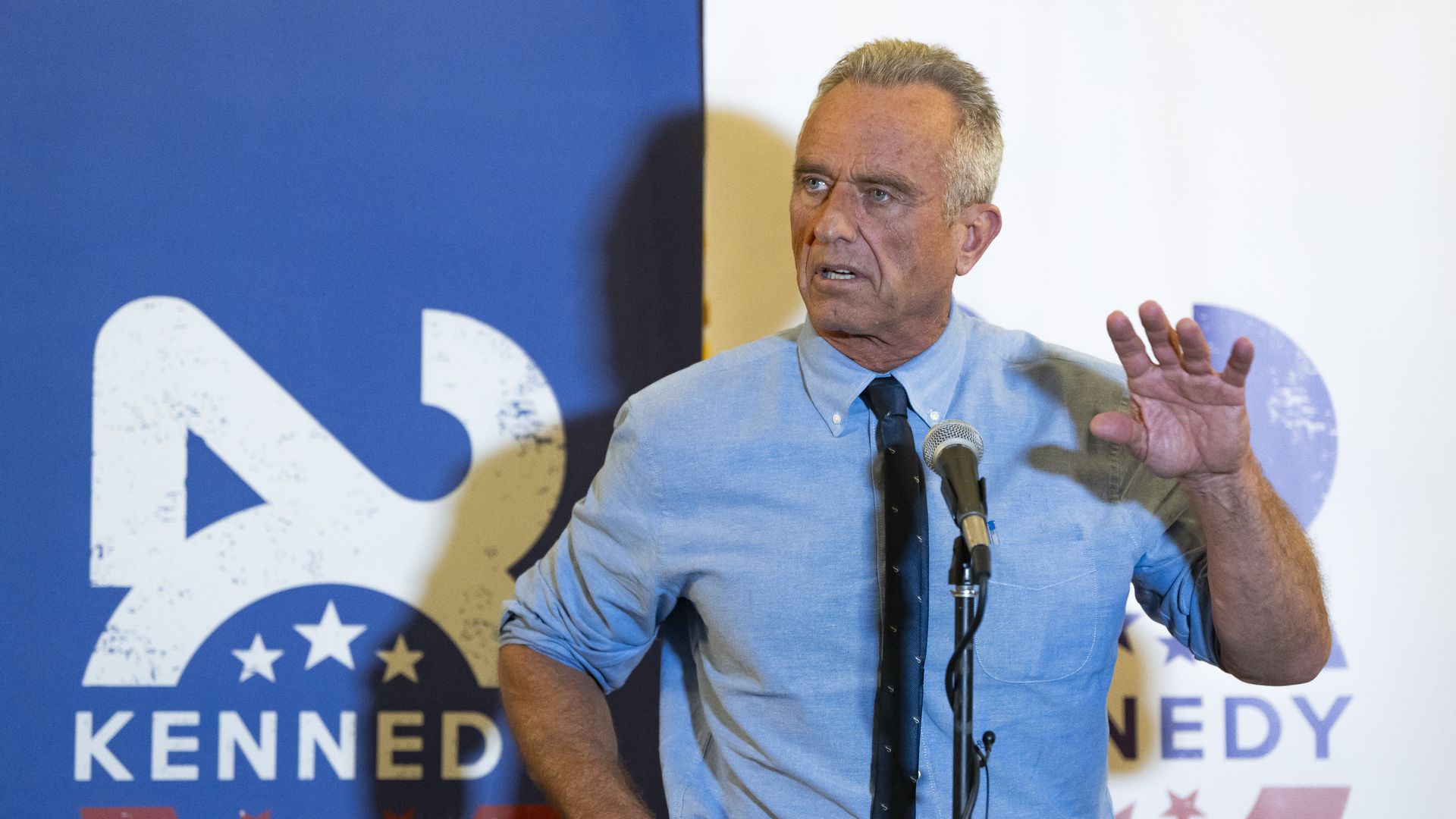 Robert F. Kennedy Jr. takes questions from media after his campaign rally at Legends Event Center on December 20,