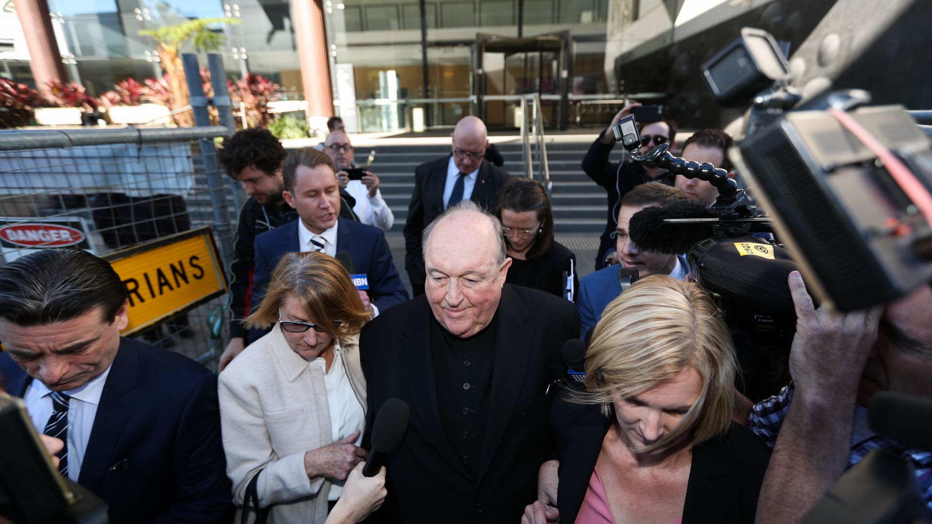 Archbishop Philip Wilson leaving courthouse