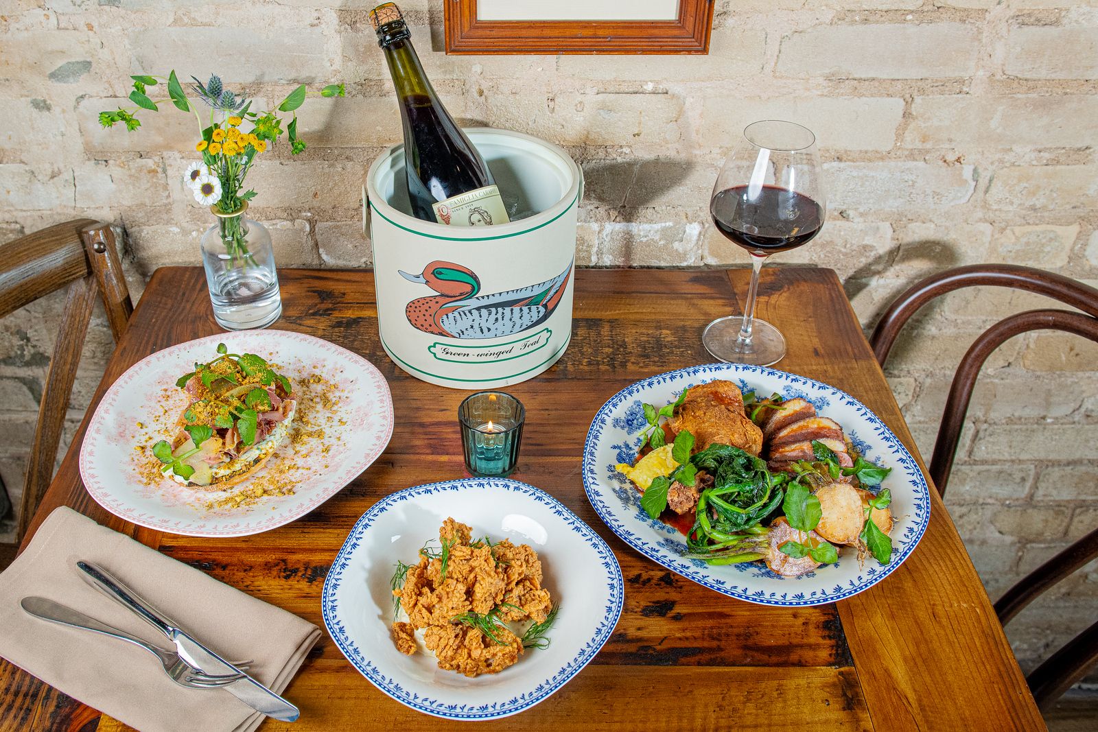 Southern plates on a wooden table at Mallard