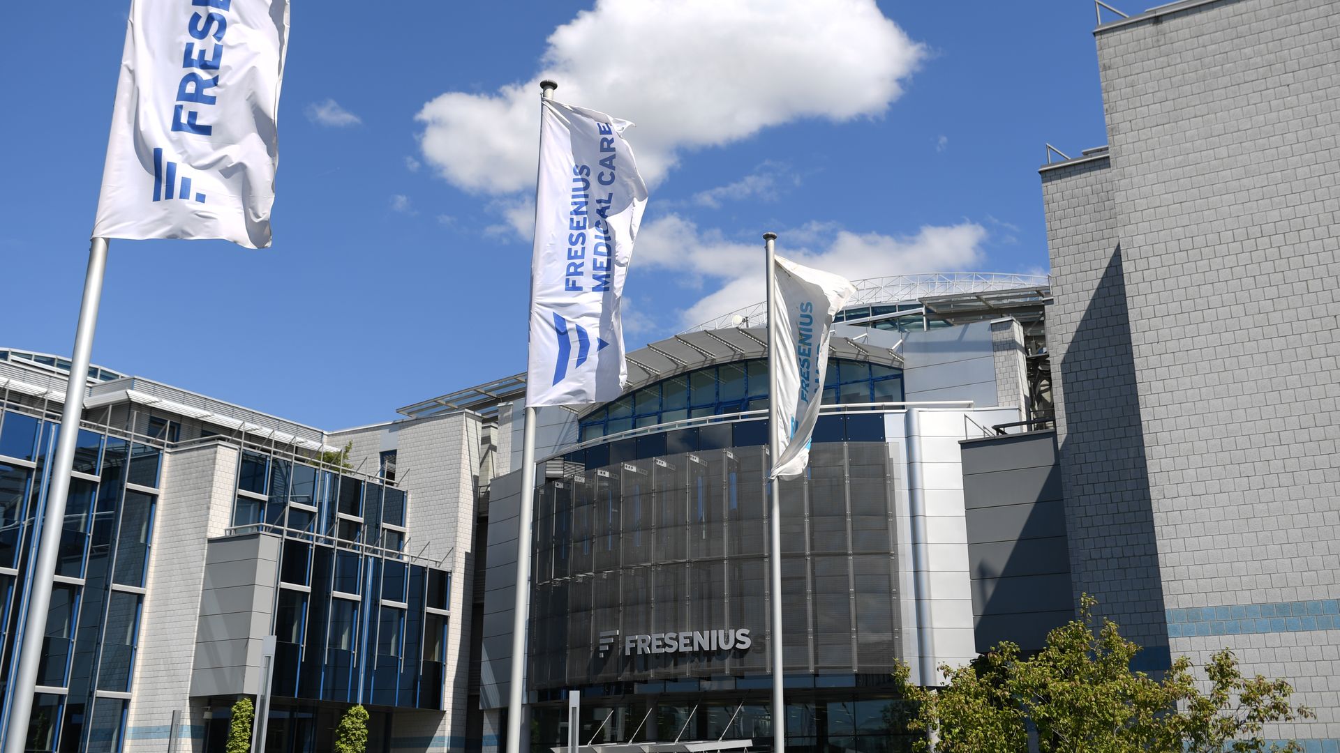 Fresenius flags fly in front of the Fresenius headquarters building.