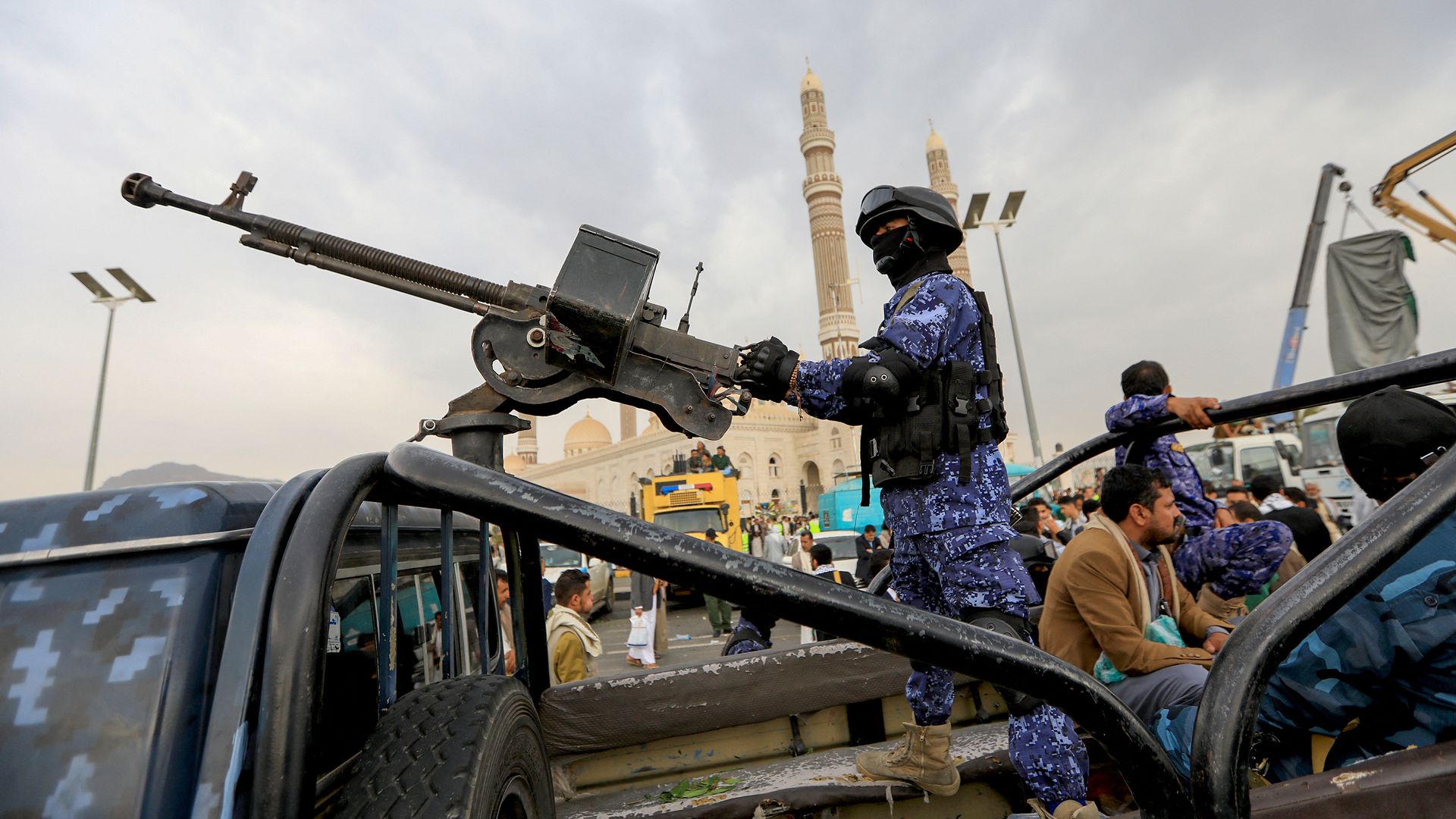 Security forces affiliated with Yemen's Huthi group stand guard during a rally in the Huthi-controlled capital Sanaa in solidarity with Palestinians on July 19, 2024, amid the ongoing conflict in the Gaza Strip between Israel and the Palestinian Hamas movement. 