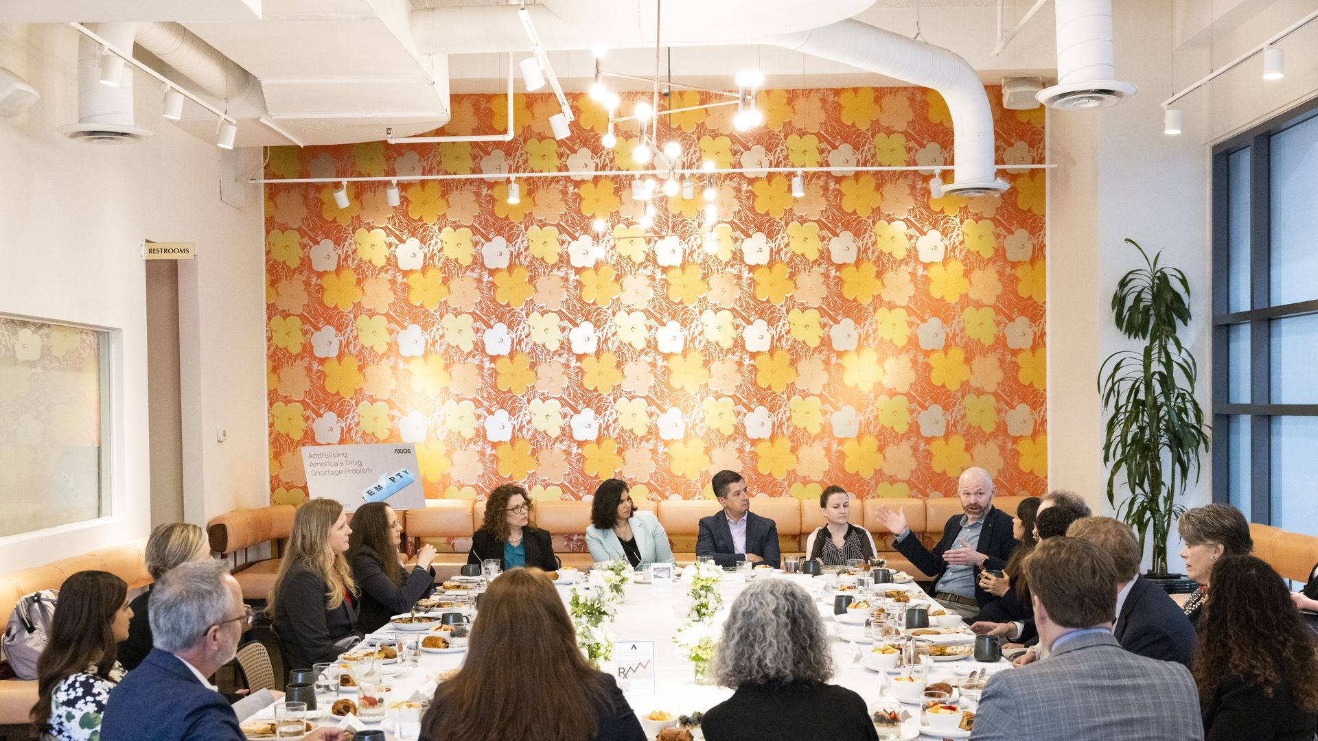Attendees enjoyed breakfast during the intimate roundtable discussion. Credit: Kristoffer Tripplaar for Axios 