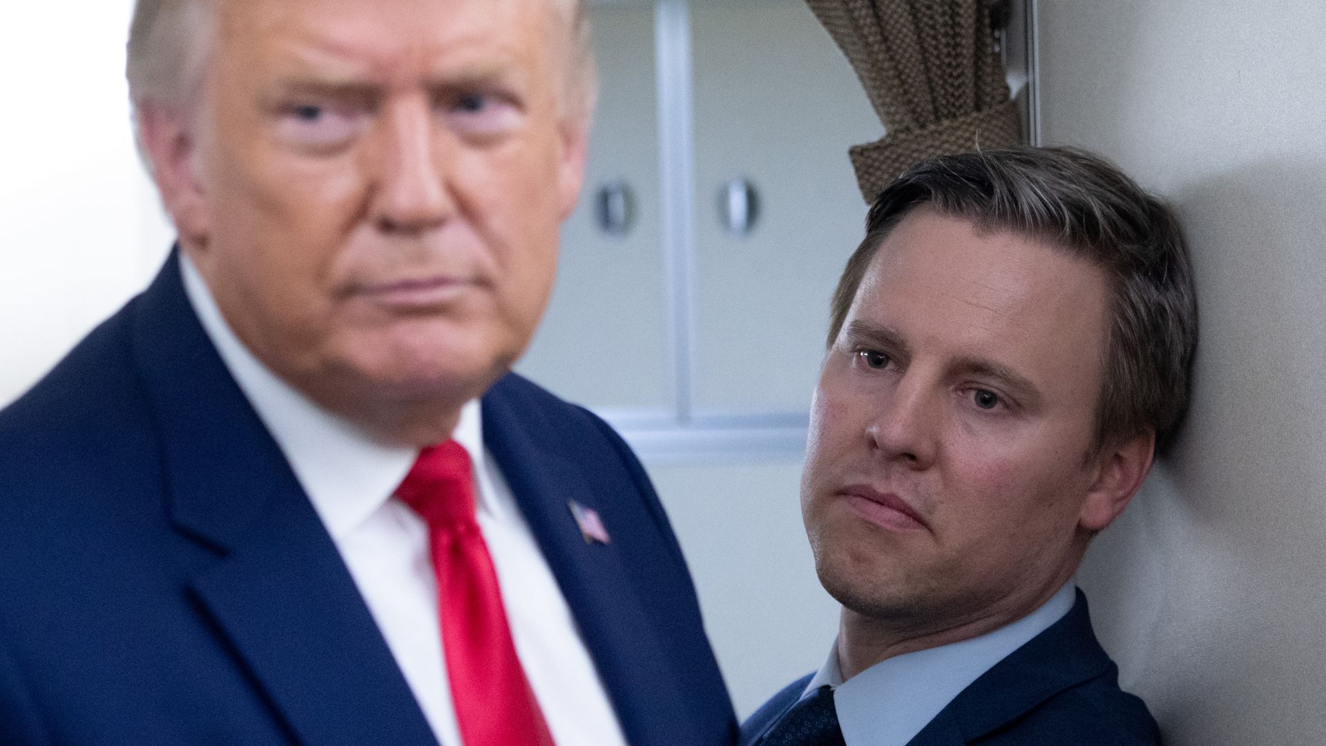 Picture of Bill Stepien standing behind Donald Trump