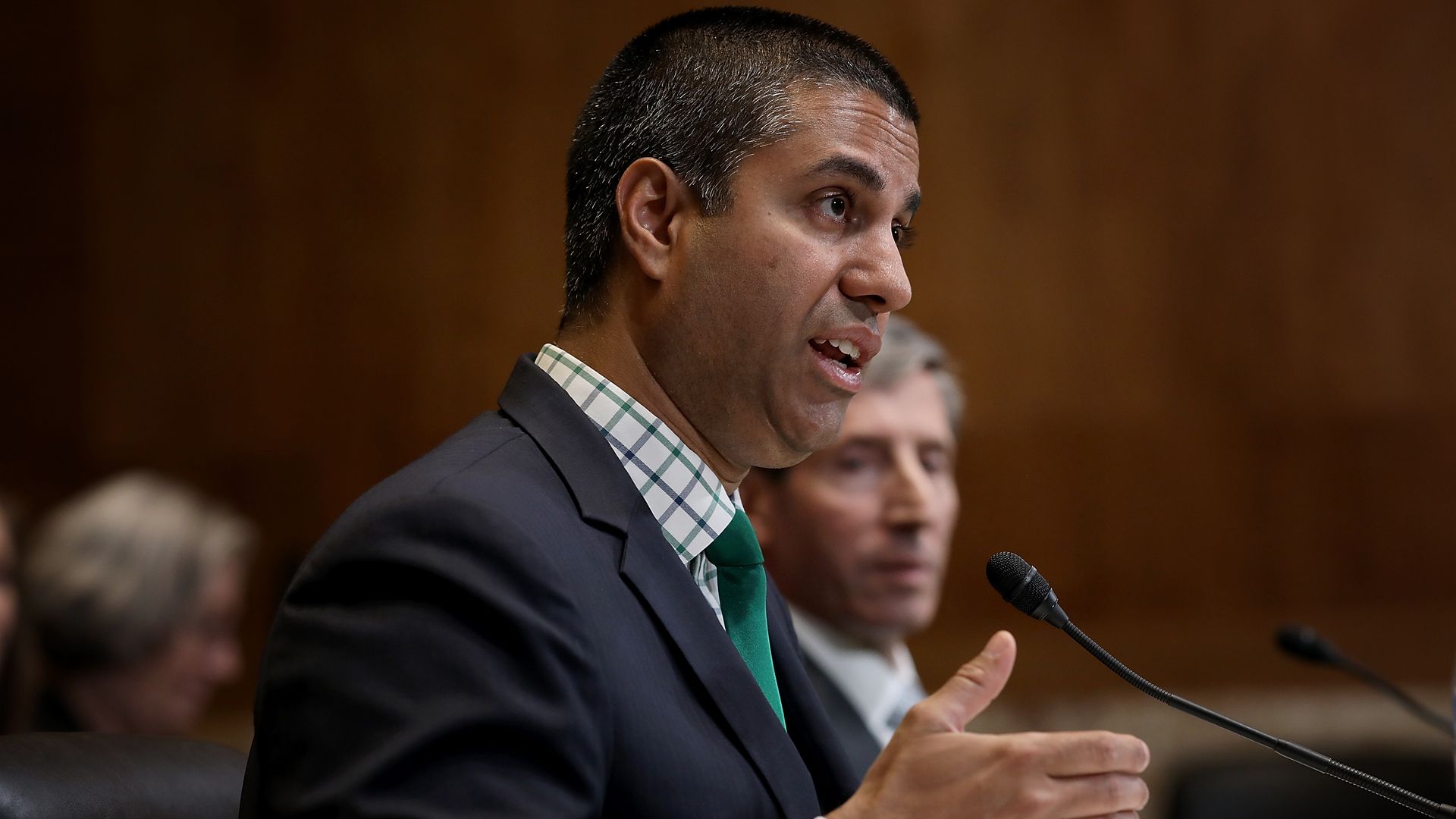 FCC chairman Ajit Pai speaking at a hearing