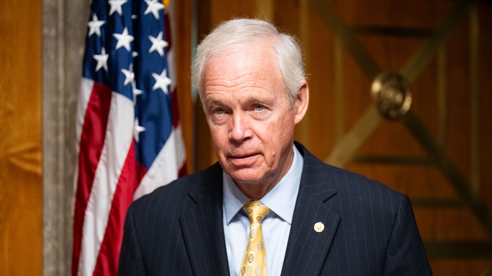 Sen. Ron Johnson, R-Wisc., arrives for the Senate Homeland Security and Governmental Affairs Committee hearing 