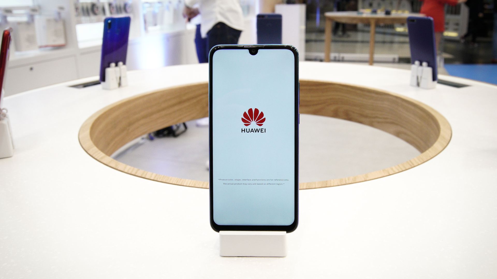 A Huawei mobile phone is seen on display at the flagship store in Warsaw, Poland