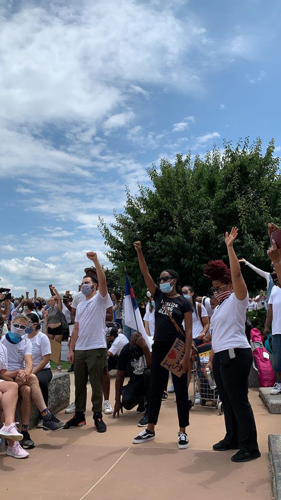 Protestors with fists raised