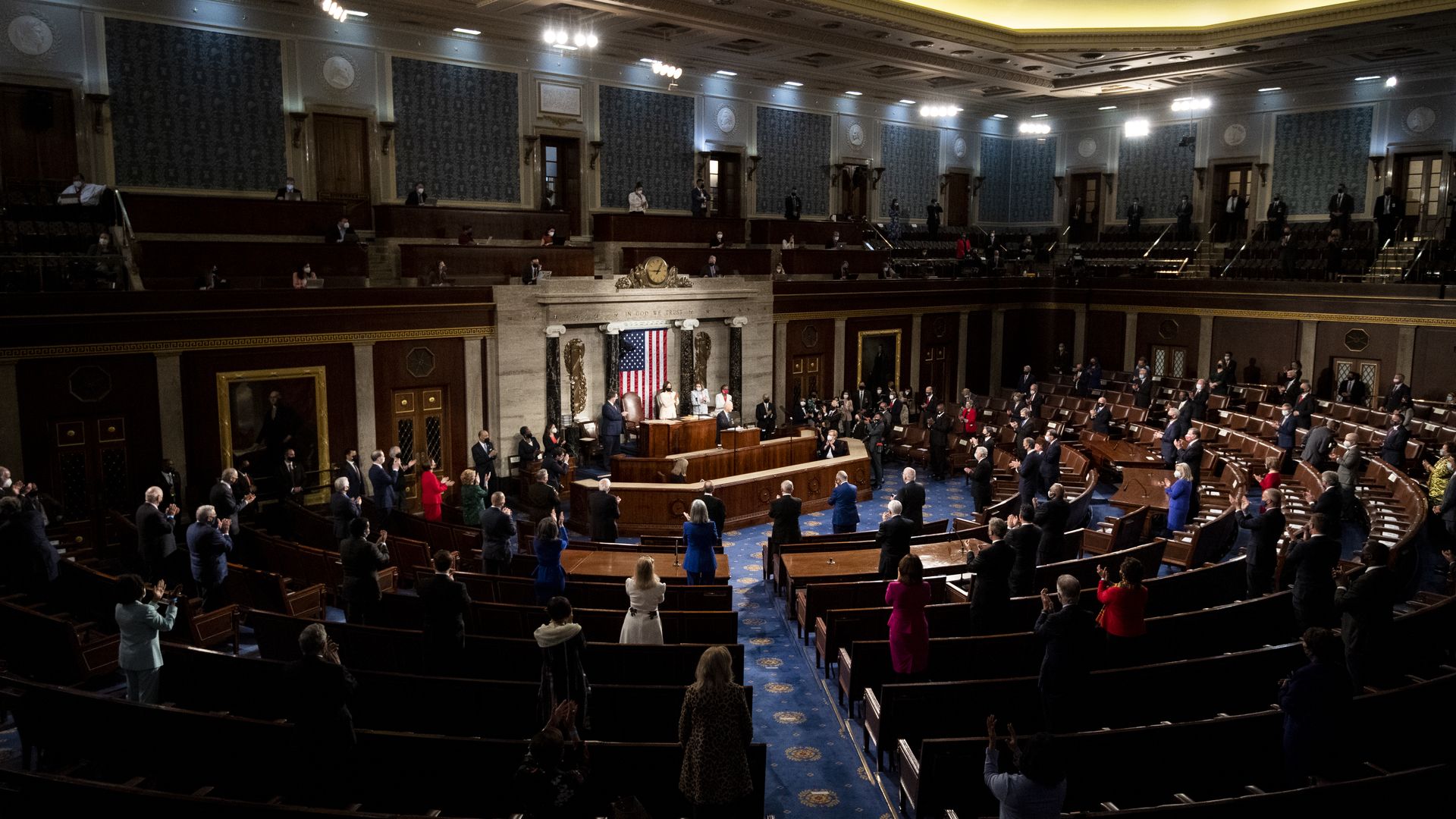 President Biden is seen addressing a social distanced Joint Session of Congress last March.