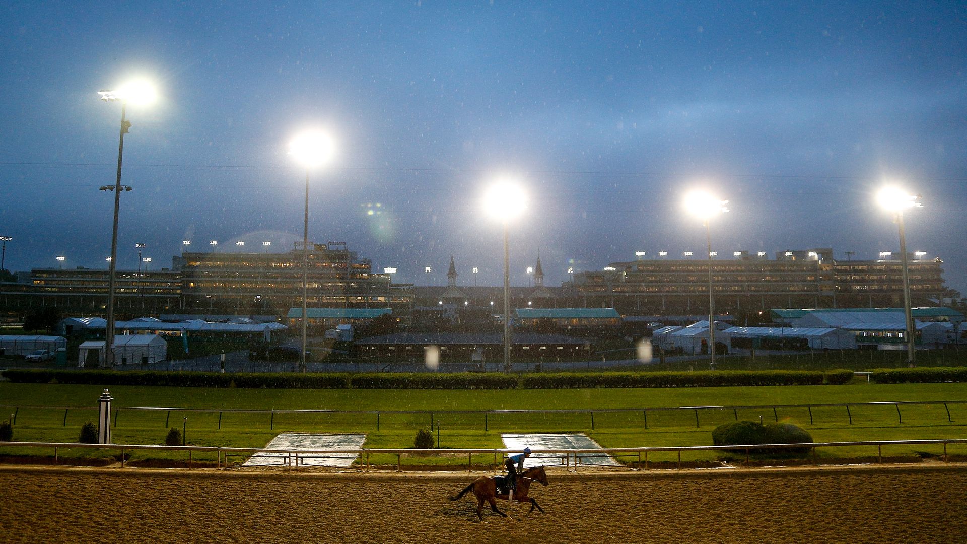 A horse trains on the track during morning workouts in preparation for the 144th Kentucky Derby .