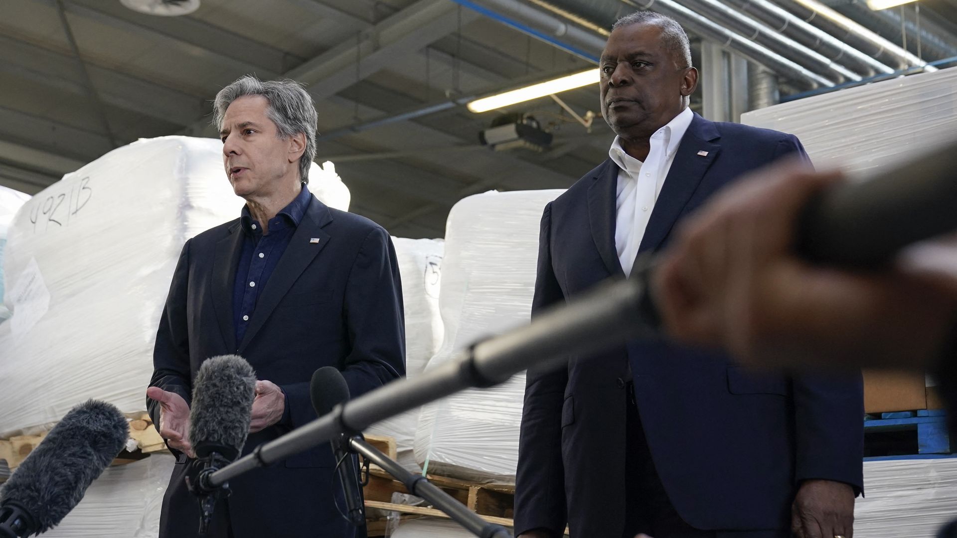 Secretary of State Antony Blinken (L) and Secretary of Defense Lloyd Austin speak with reporters after returning from their Kyiv meeting with Ukrainian President Volodymyr Zelensky, on April 25.