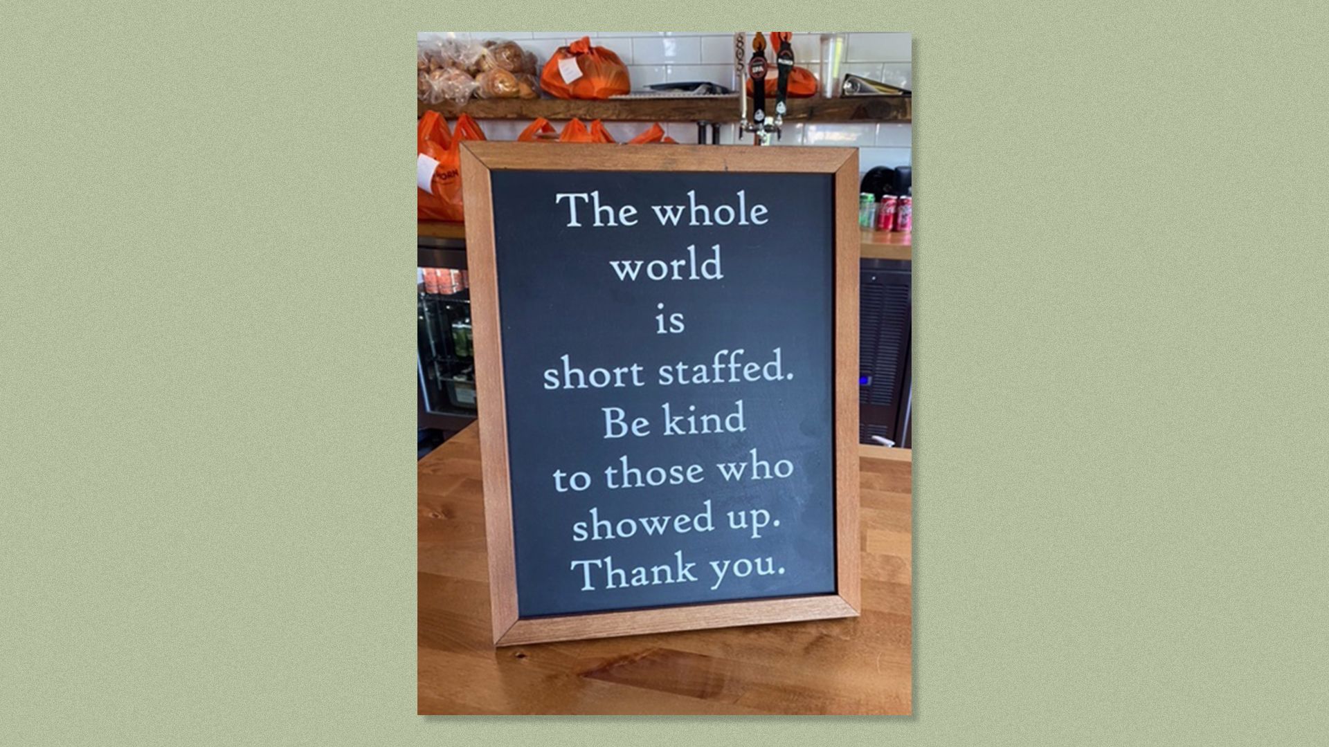 A chalkboard in a restaurant reminds customers that everyone is short-staffed these days.