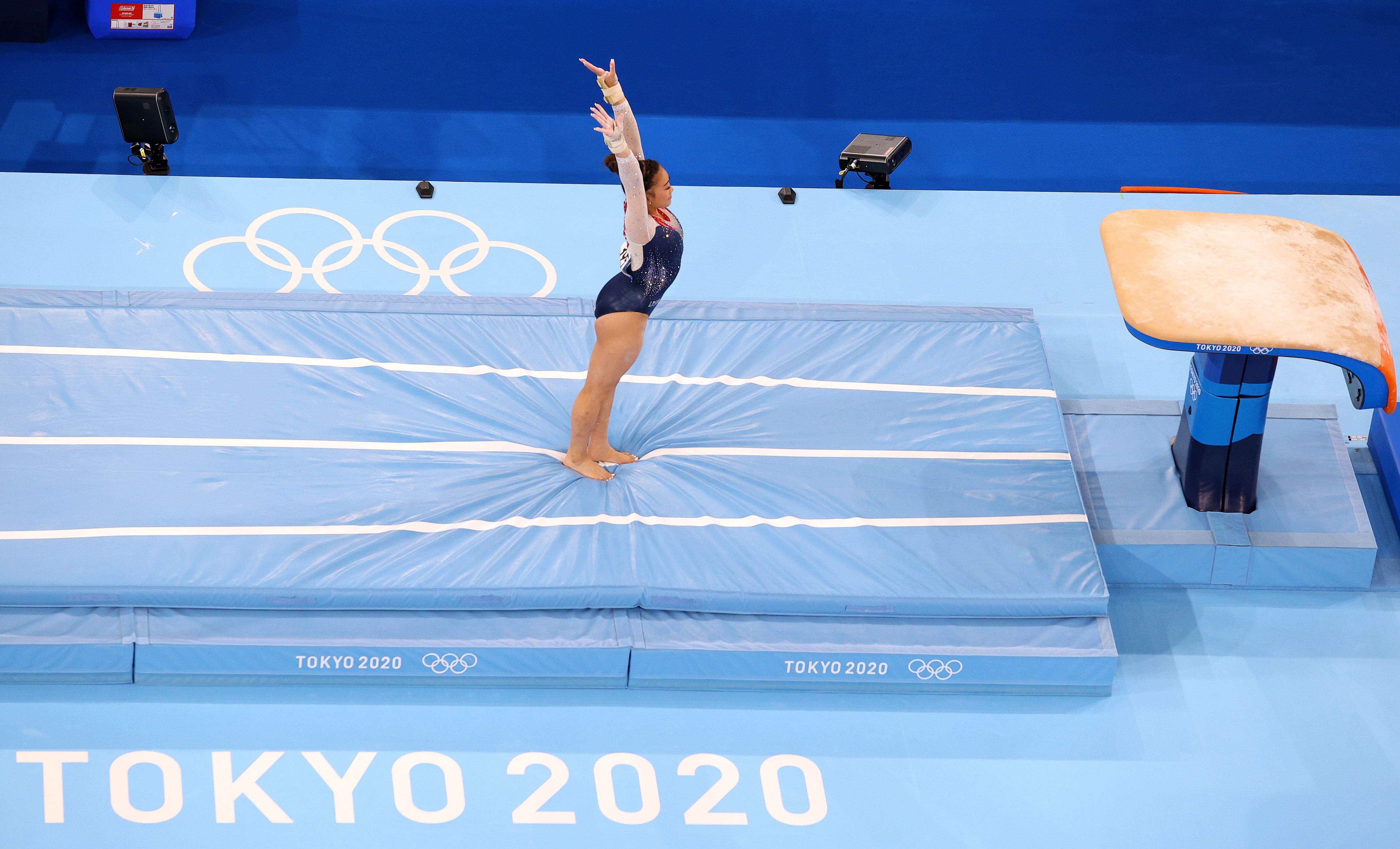 Suni Lee competes on vault during the Olympic all-around event in Tokyo.  (Photo by Jamie Squire/Getty Images)