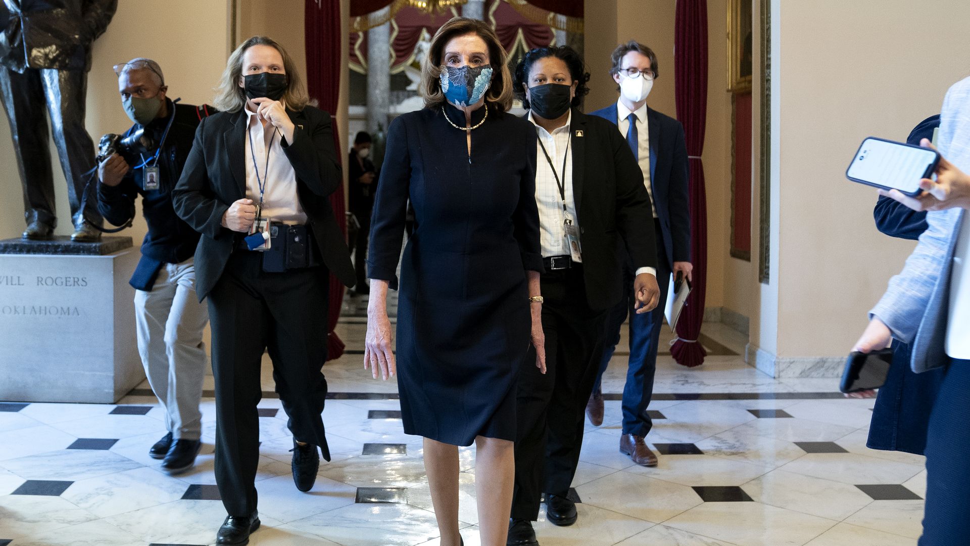 Nancy Pelosi walking to the House Floor