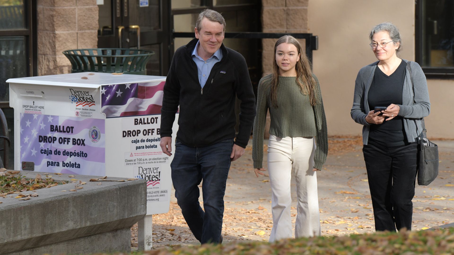 Sen. Michael Bennet, left, his wife Susan, right, and their daughter Anne drop off their ballots Wednesday at Washington Park in Denver. Photo: Hyoung Chang/The Denver Post