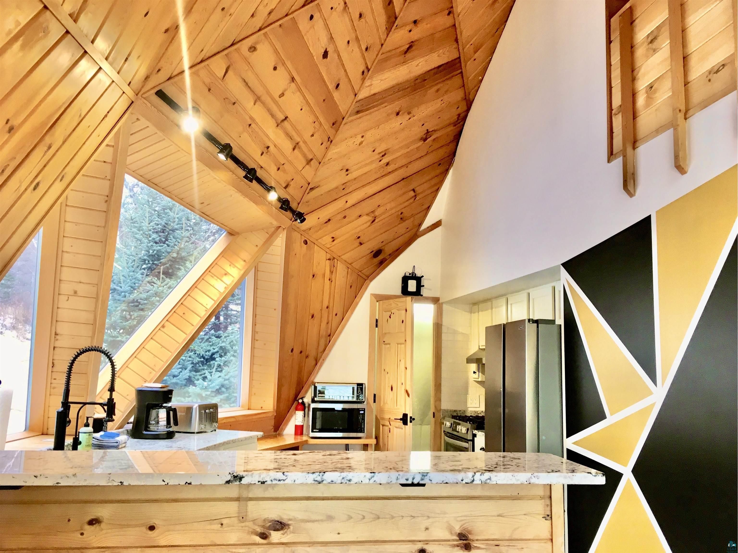 A kitchen in a dome-shaped home.
