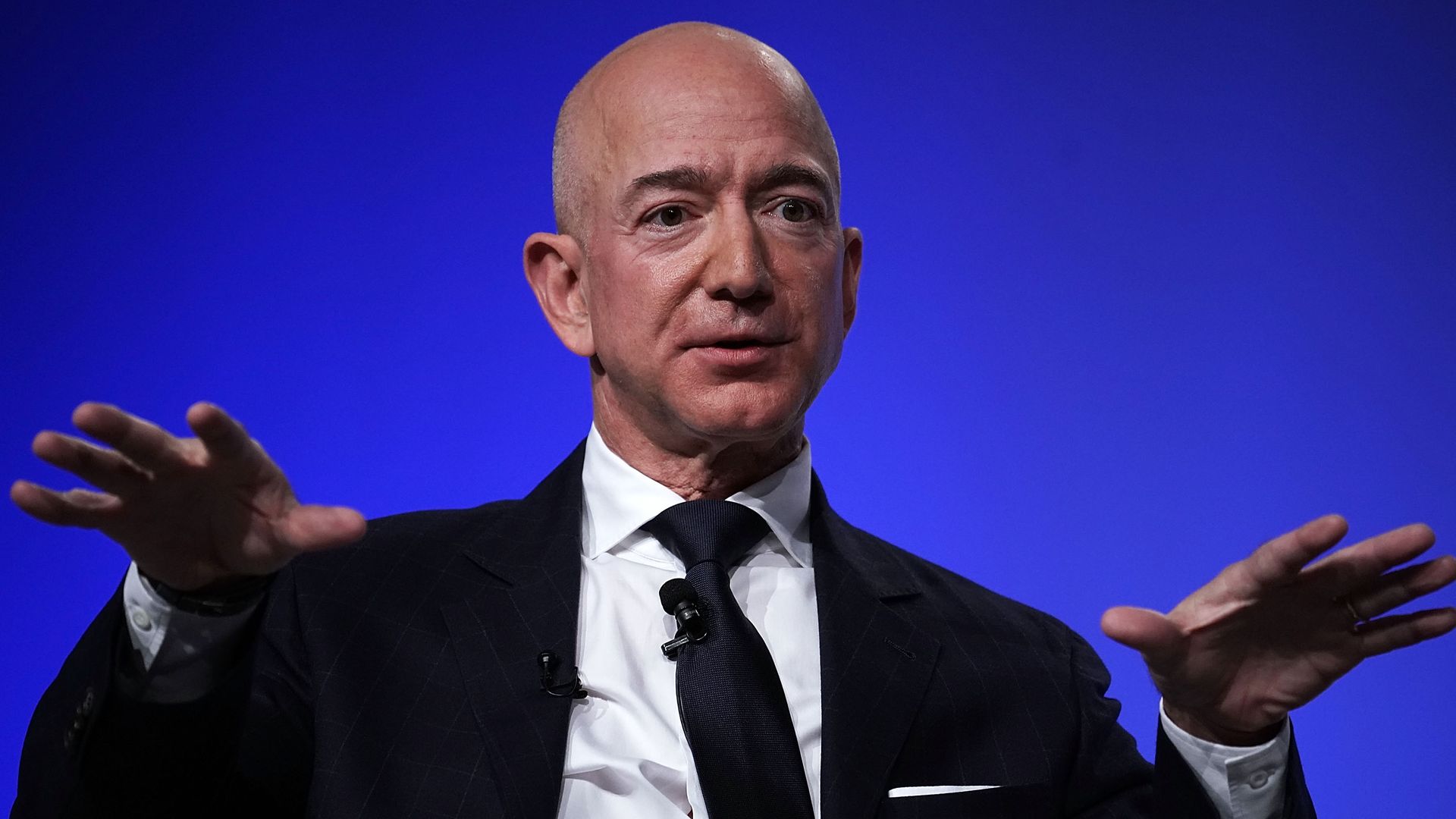 Amazon CEO Jeff Bezos gestures as he speaks