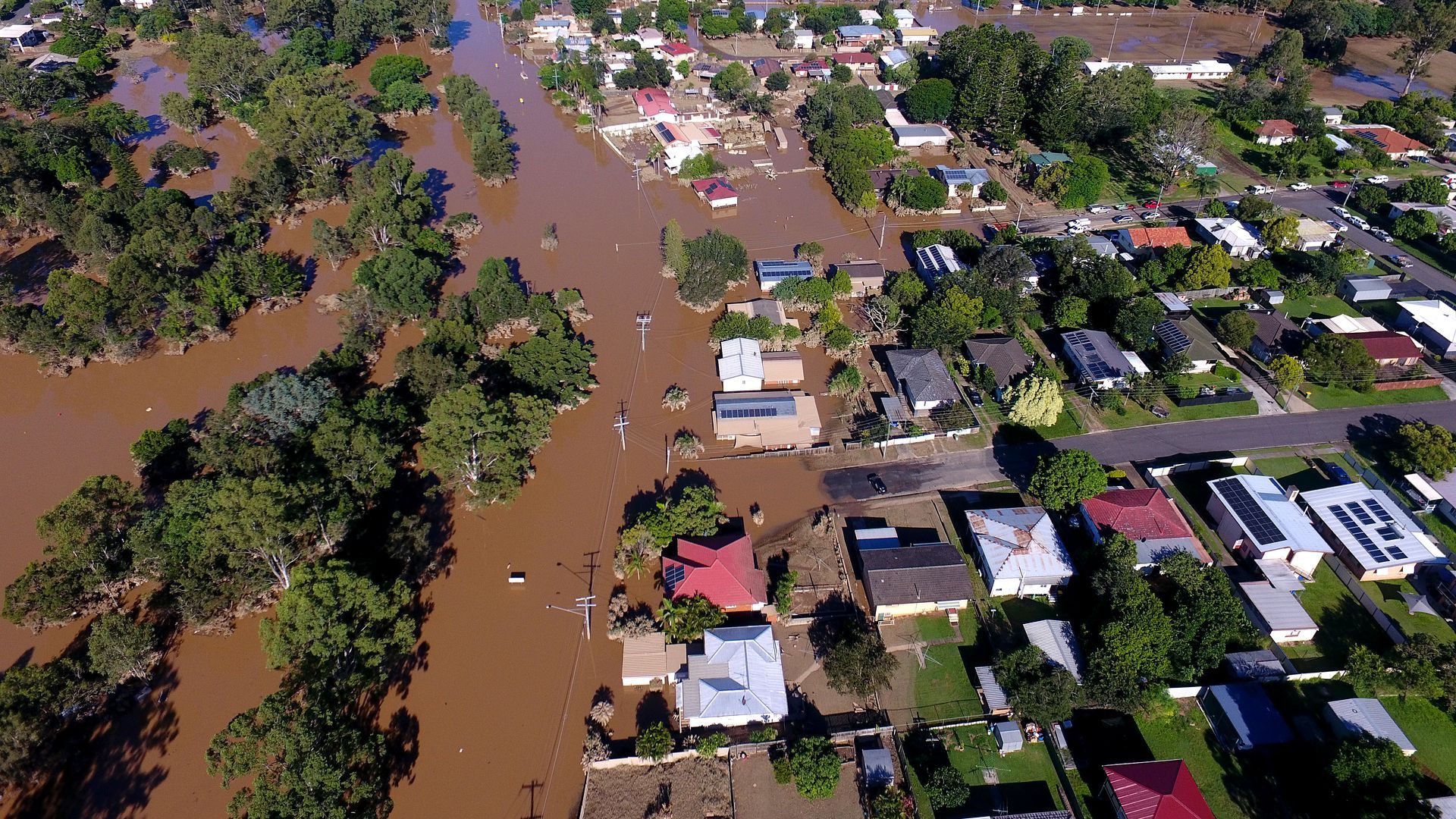 Properties in the suburb of Goodna in the far southwestern outskirts of Brisbane, Australia, are seen inundated by floodwaters on March 1. 