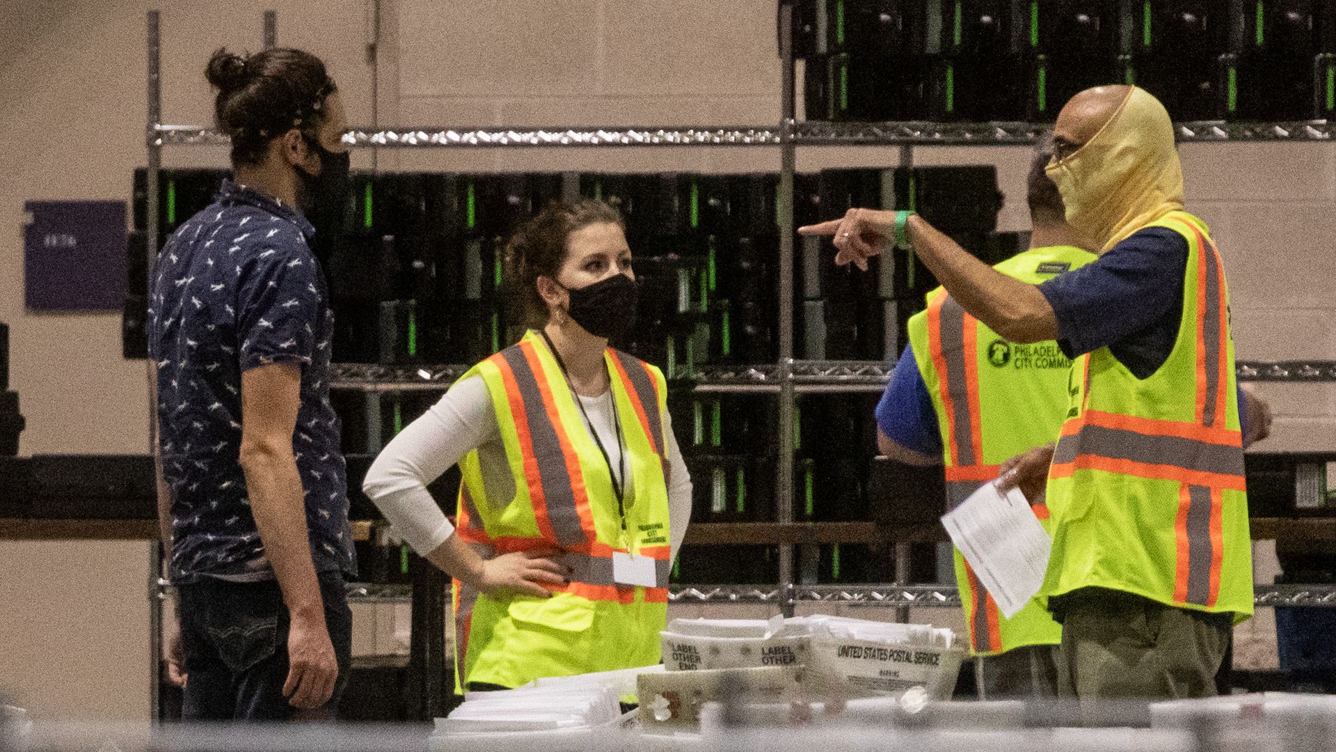Election workers count ballots at the Philadelphia Convention Center on November 06, 2020 in Philadelphia, Pennsylvania. 