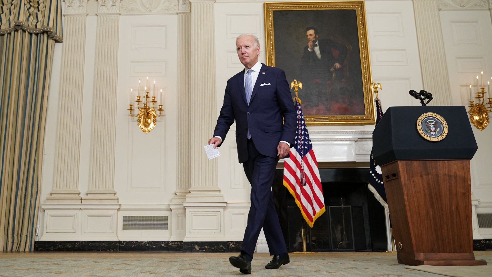 US President Joe Biden leaves after speaking about the Inflation Reduction Act of 2022 in the State Dining Room of the White House