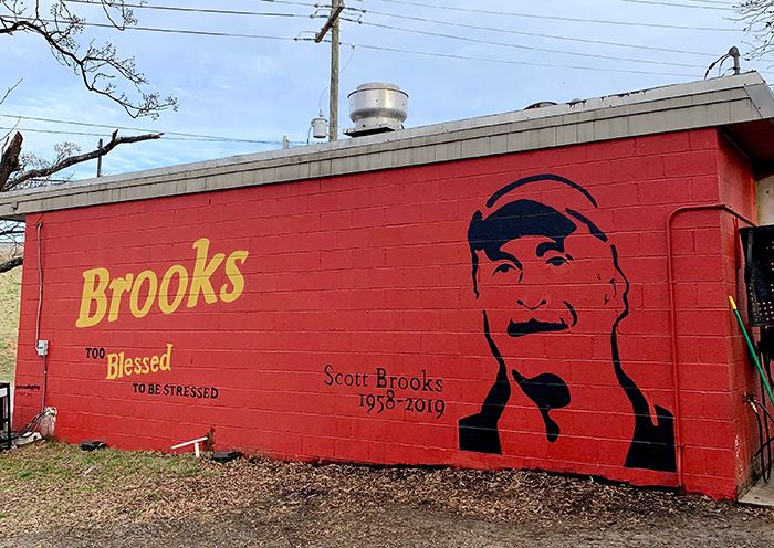 A mural of Scott Brooks was painted onto his family's business, Brooks' Sandwich House, after his murder in December. 