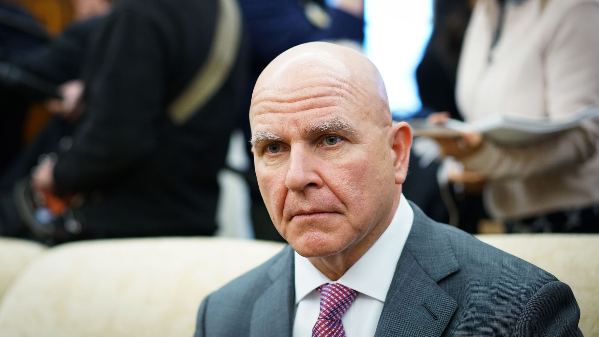 In this image, McMaster sits in the Oval Office.