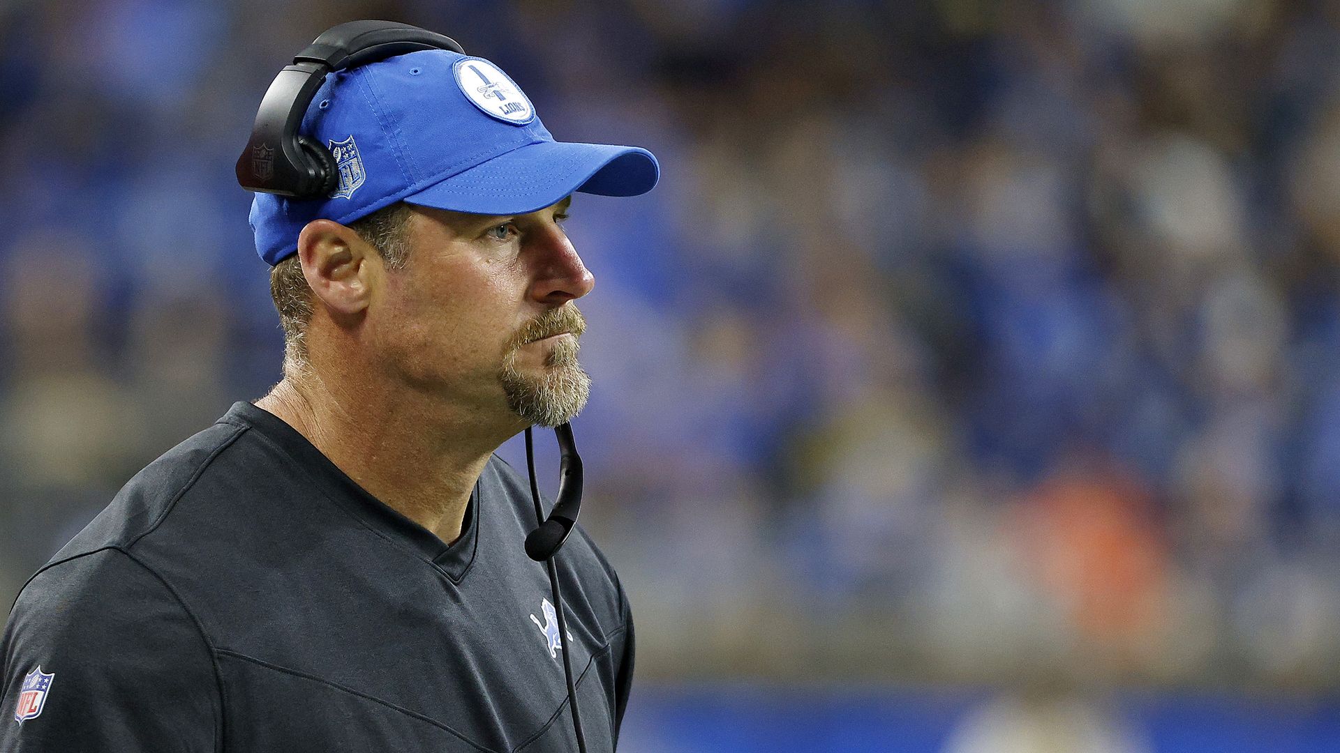 Lions head coach Dan Campbell stares ahead in a game against the Bears last season.