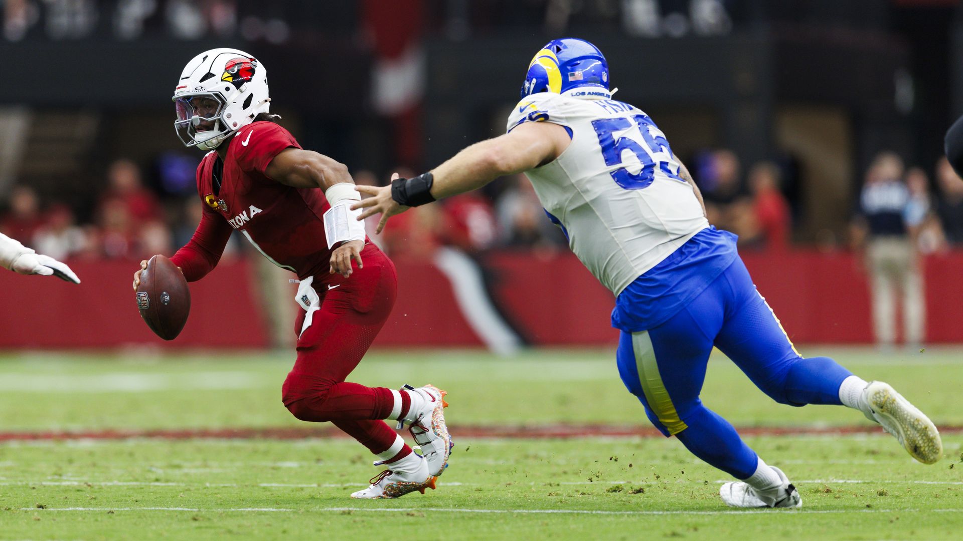 Cardinals quarterback Kyler Murray scrambles against the Los Angeles Rams last weekend.