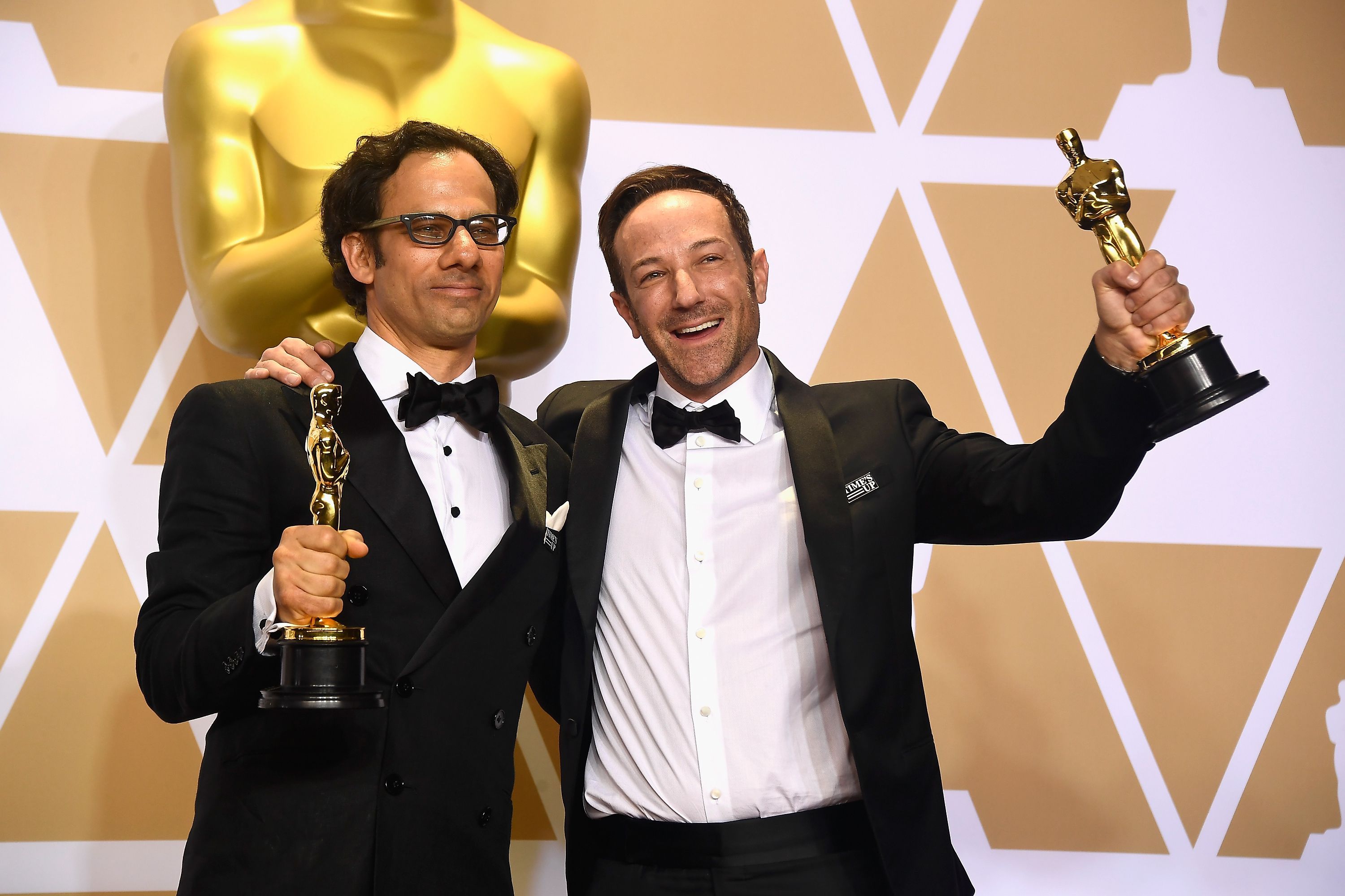 Producer Dan Cogan (l) and director Bryan Foge after winning Best Documentary Feature at the Academy Awards in 2018
