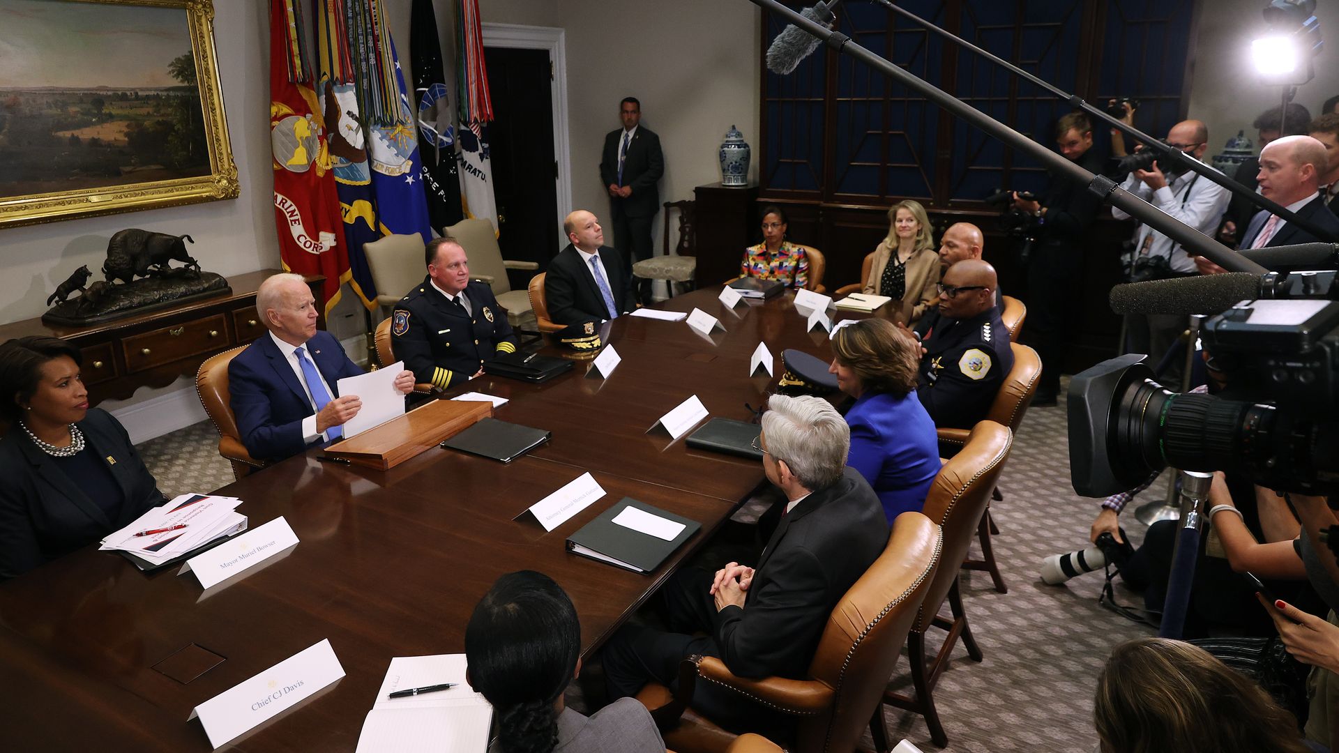 President Biden is seen discussing Cuba before a meeting focused on gun violence.