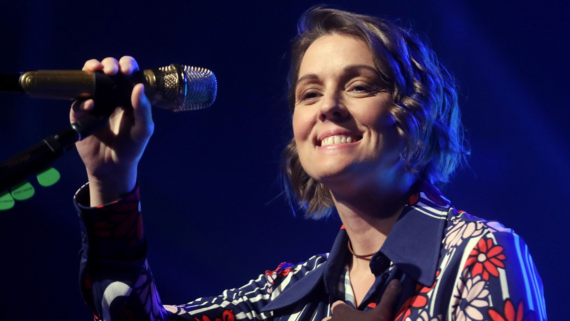 Brandi Carlile smiling on stage