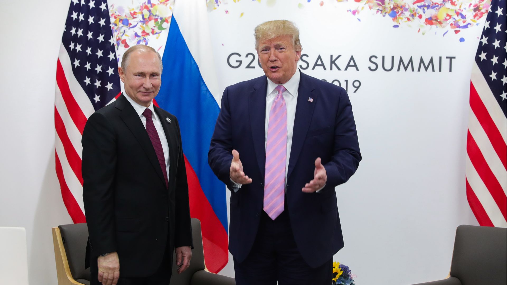 Photo of Donald Trump and Vladimir Putin standing next to each other