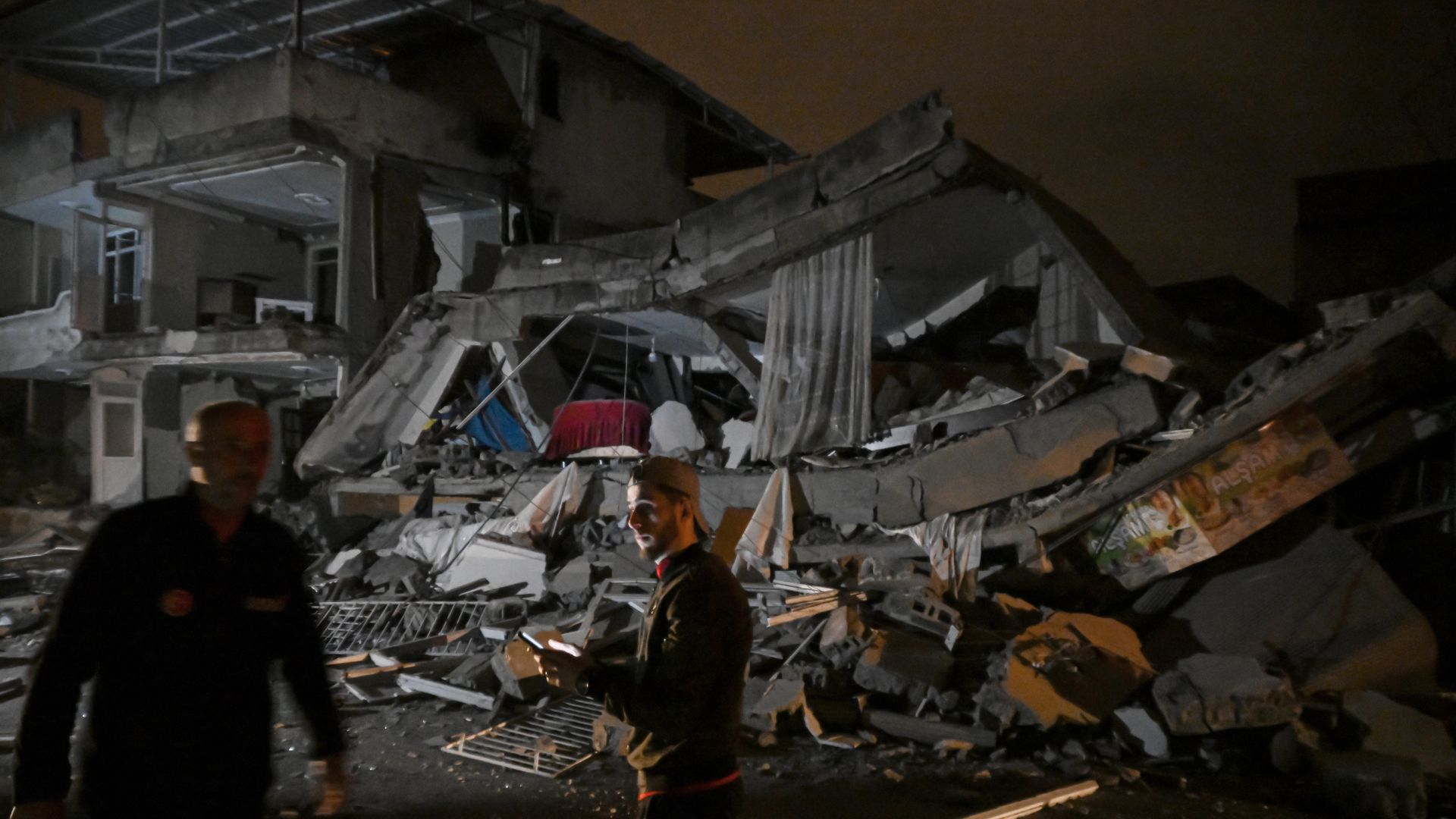 A view of a collapsed building after 6.4 and 5.8 magnitude earthquakes 