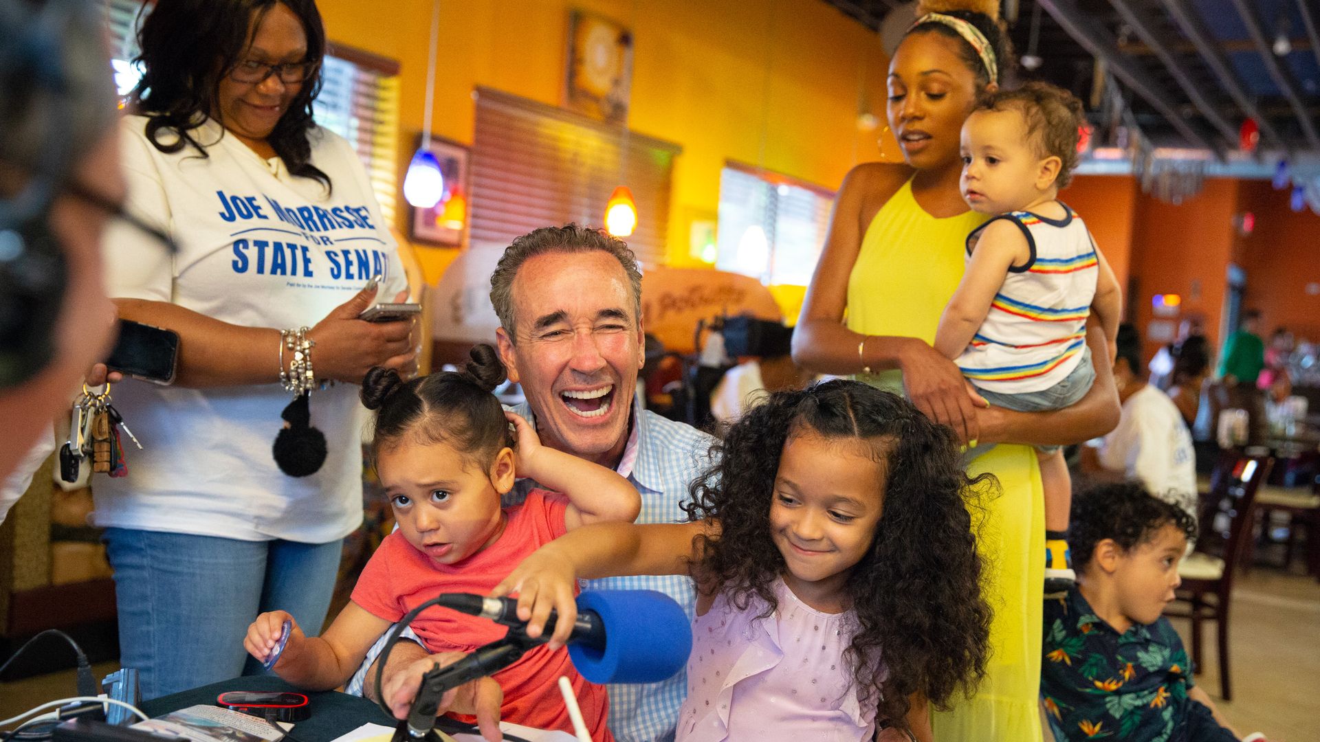 Virginia state senator celebrating with his wife and several of his children after a campaign victory.
