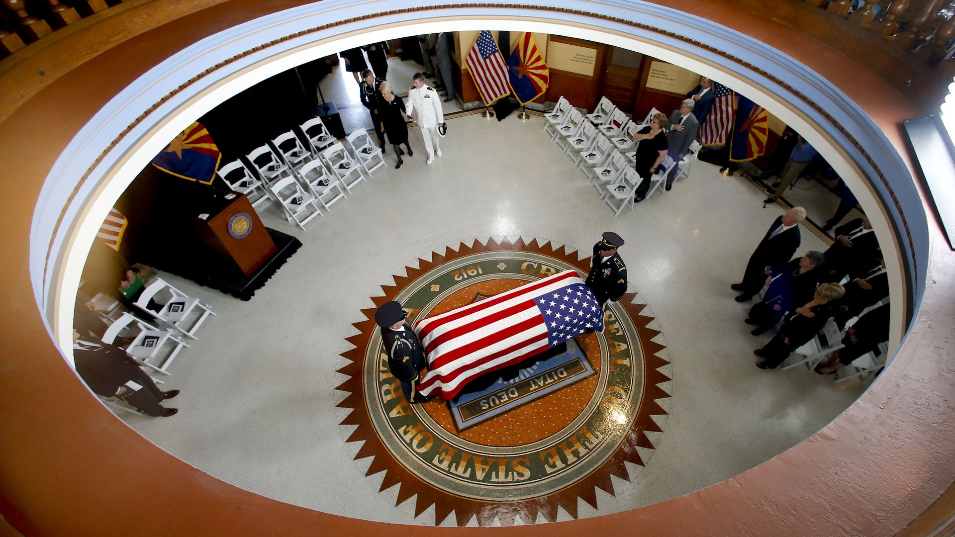McCain's casket covered in an American flag, seen from above