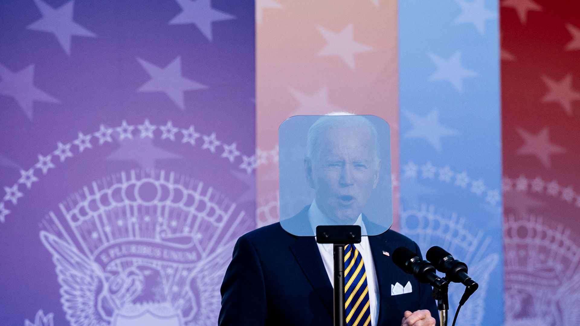 President Biden is seen through the lens of a TelePrompTer as he calls for preserving voting rights in Georgia on Tuesday.