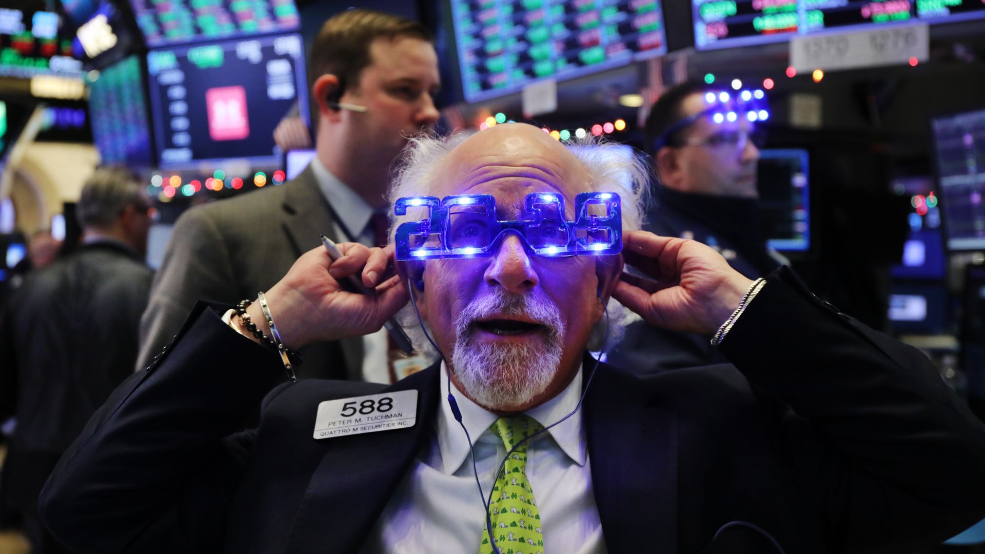 Stock traders work on the last day of 2018