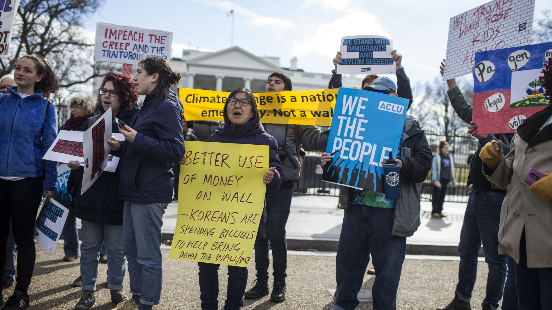 Demonstrators at a protest against President Trump's declaration of emergency powers. 