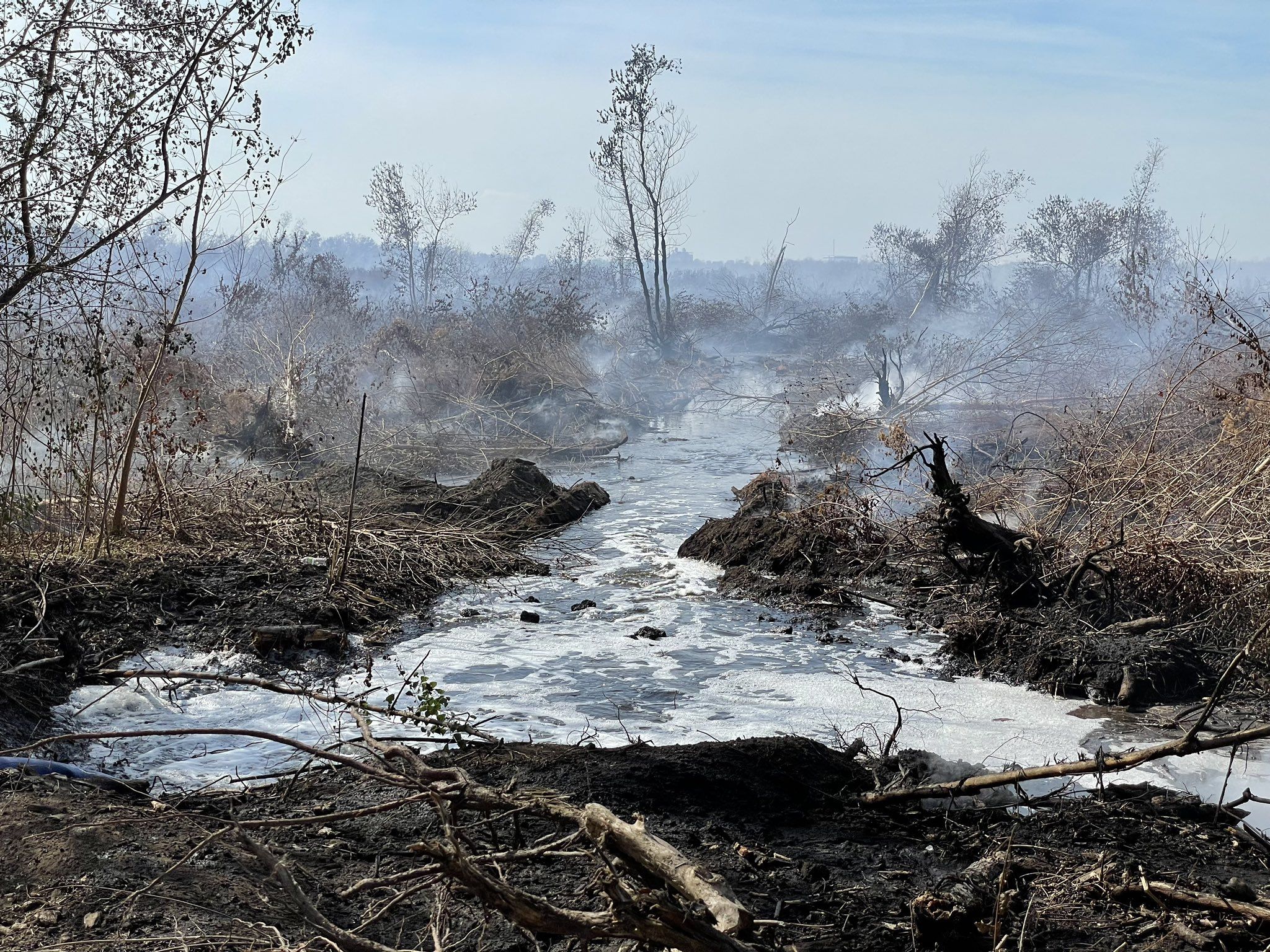 Photo shows water flooding the fire in New Orleans East
