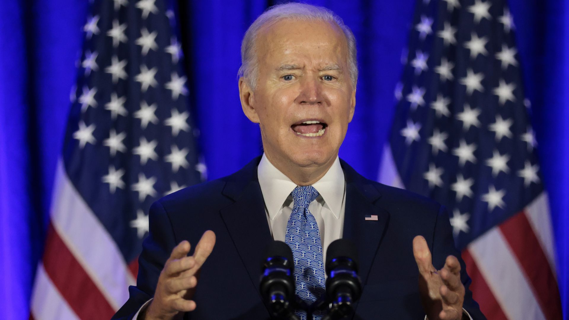 President Joe Biden speaks during the holiday celebration for the Democratic National Committee (DNC) at the Hotel Washington in Washington, D.C., U.S., on Tuesday, Dec. 14