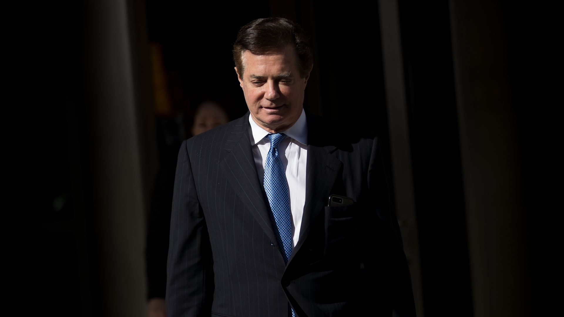 Paul Manafort, former campaign manager for Donald Trump, exits the E. Barrett Prettyman Federal Courthouse with his head down